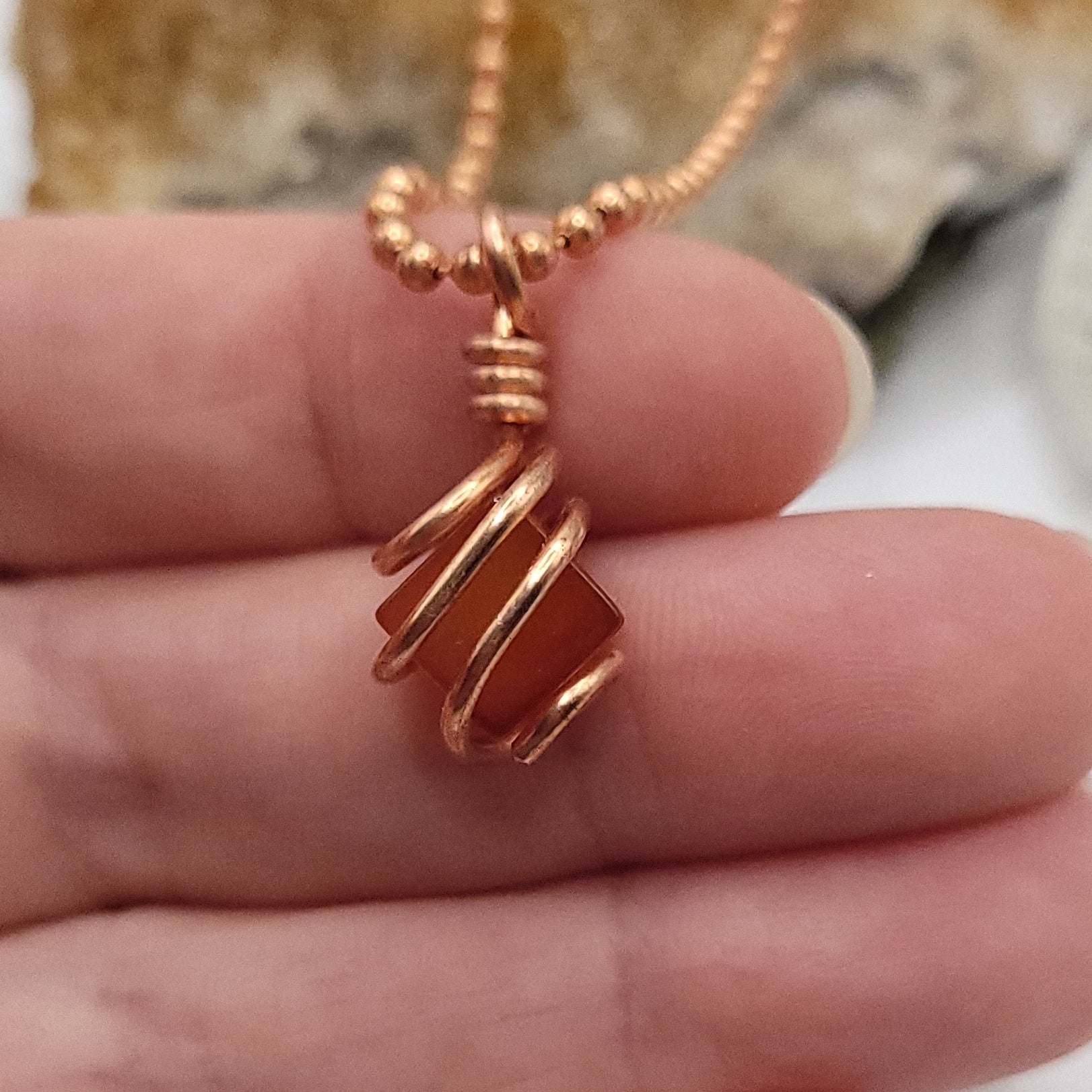 cube shaped carnelian necklace in copper wire