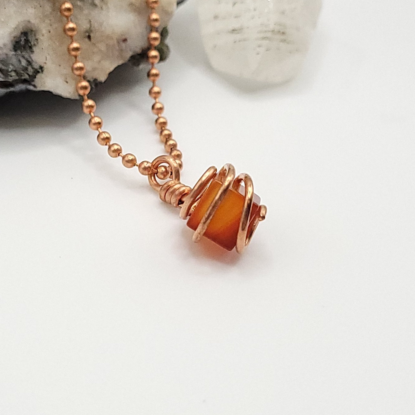 cube shaped carnelian necklace side view