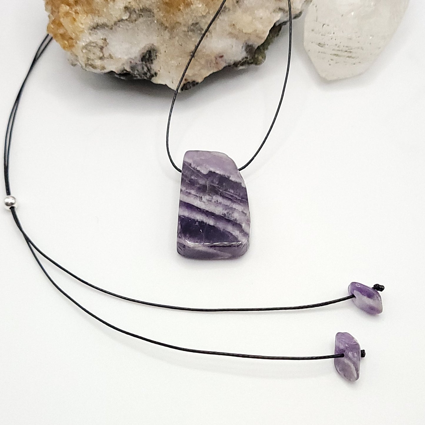 adjustable chevron amethyst necklace on white background