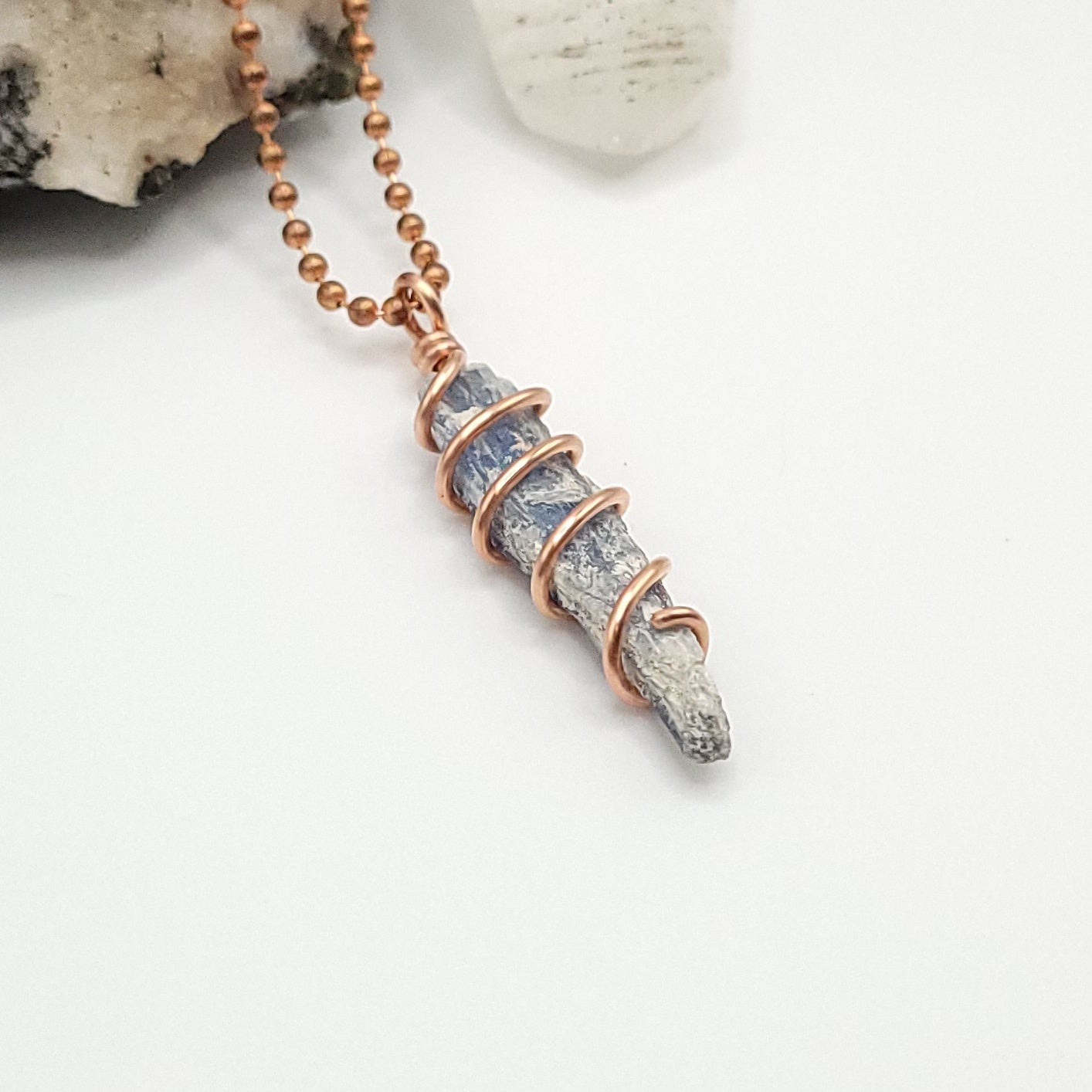 raw blue kyanite necklace in copper side view