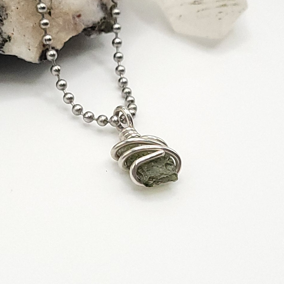 Raw Moldavite Crystal Necklace in Silver, side view