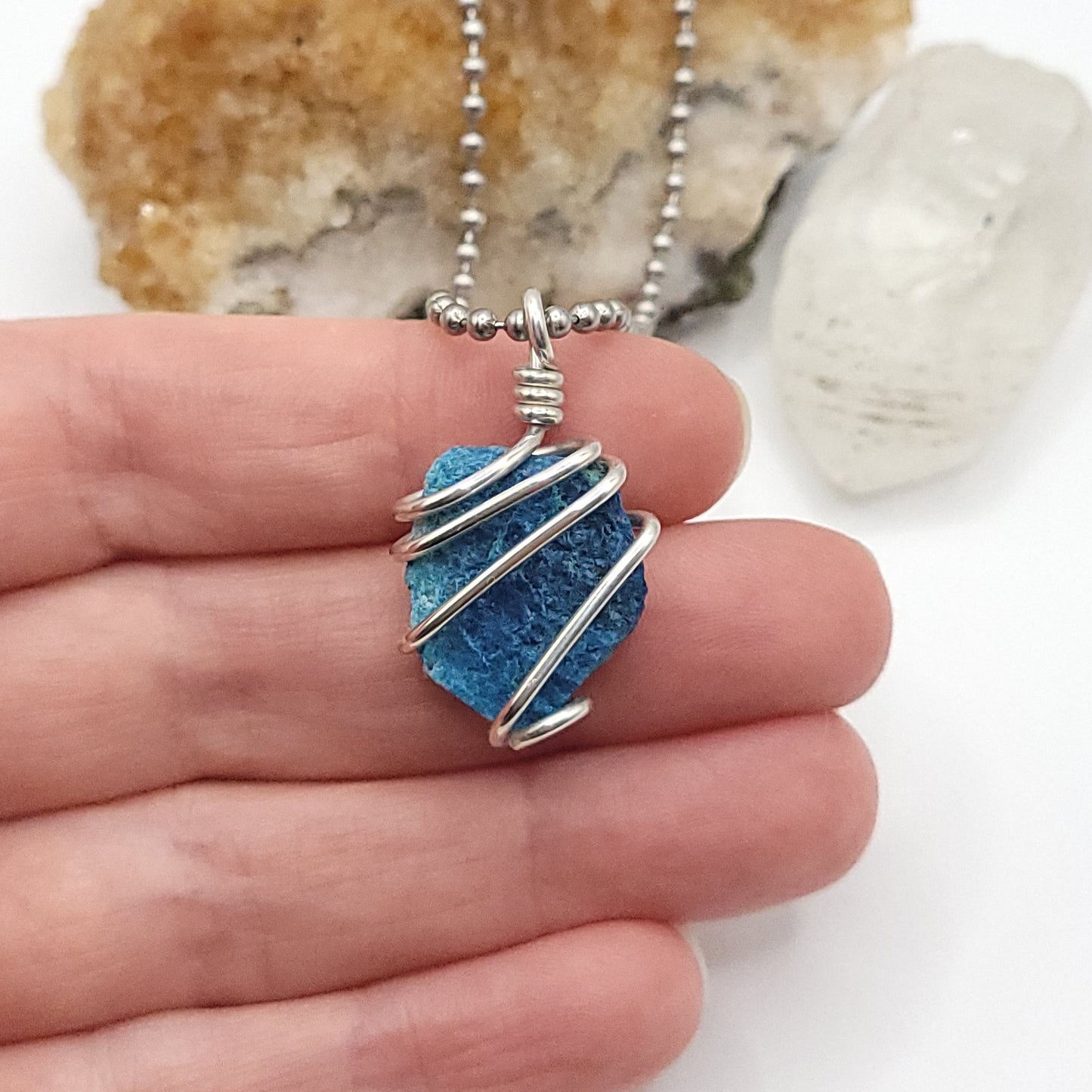 Raw Shattuckite & Chrysocolla Crystal Necklace in Silver, in hand
