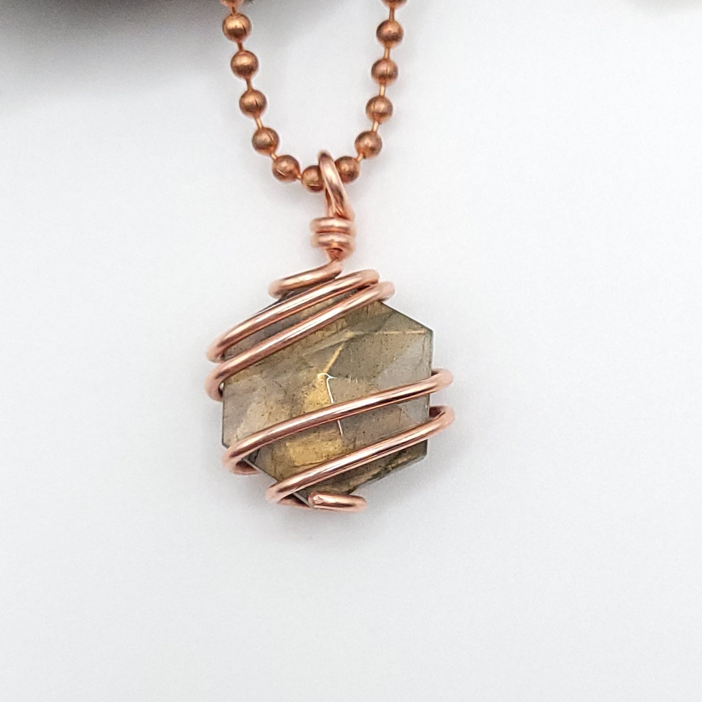hexagon labradorite necklace in copper close up