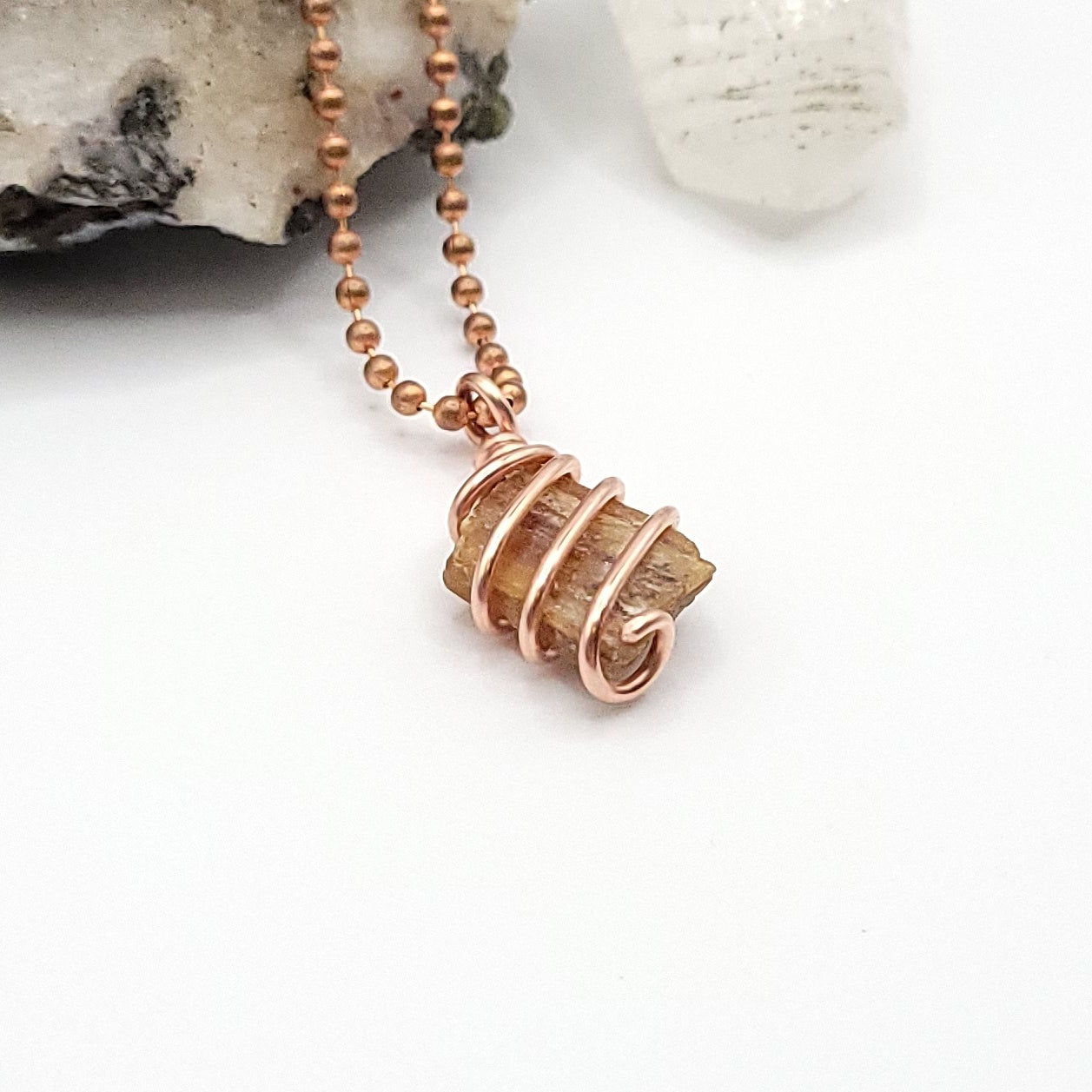 Raw Orange Kyanite Crystal Necklace in Copper, side view