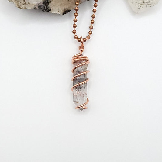 tibetan quartz necklace in copper on white background