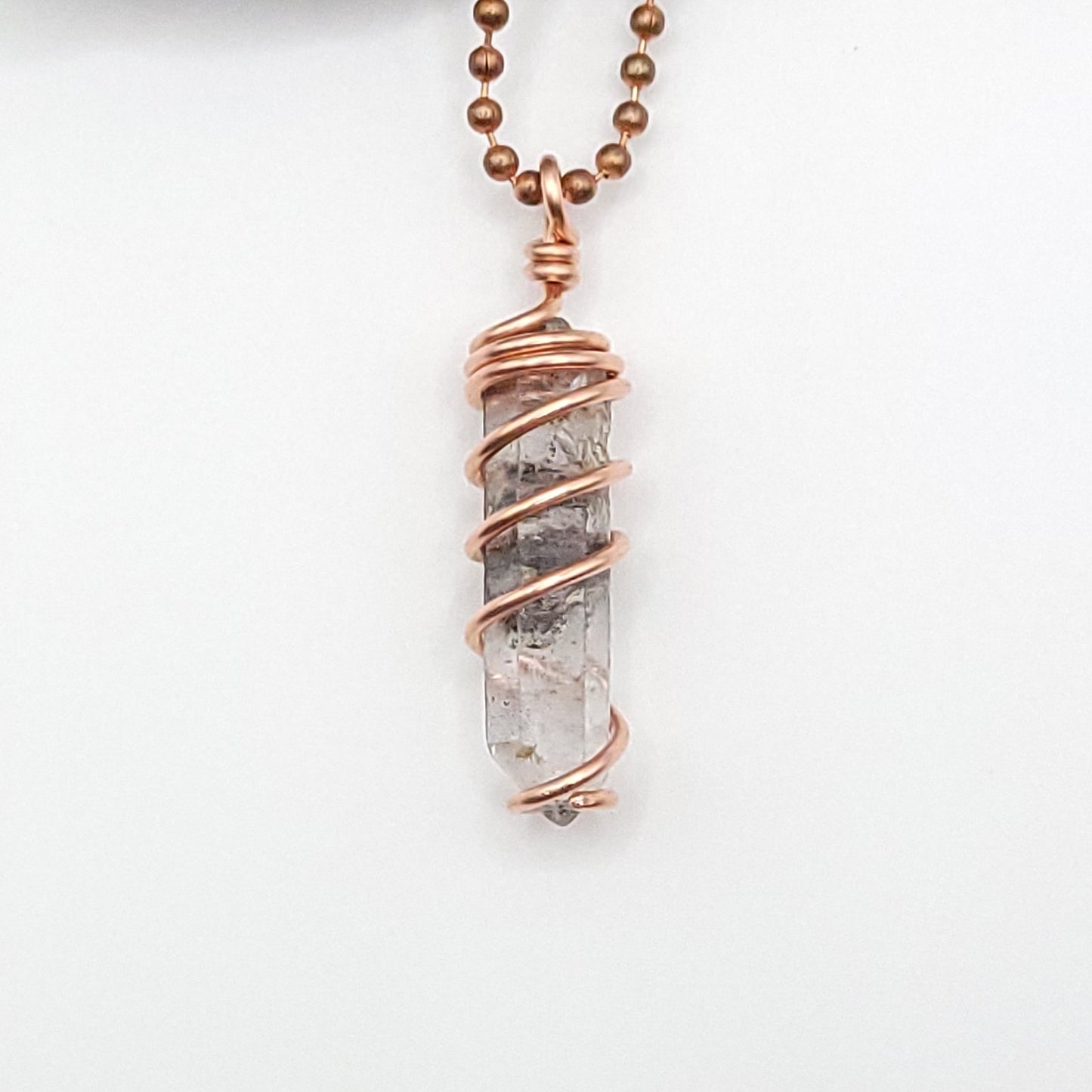 tibetan quartz necklace close up on white background