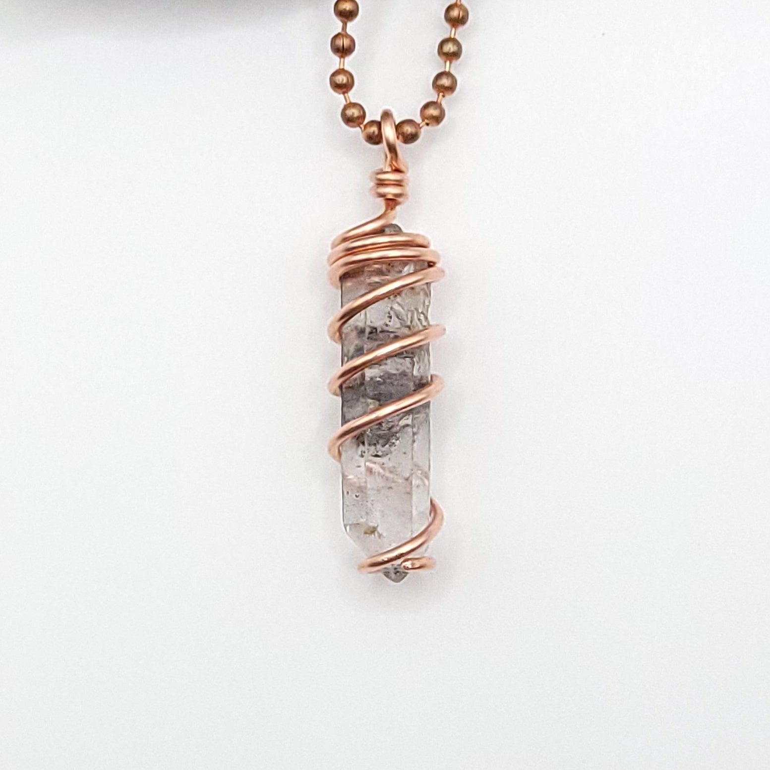 tibetan quartz necklace close up on white background
