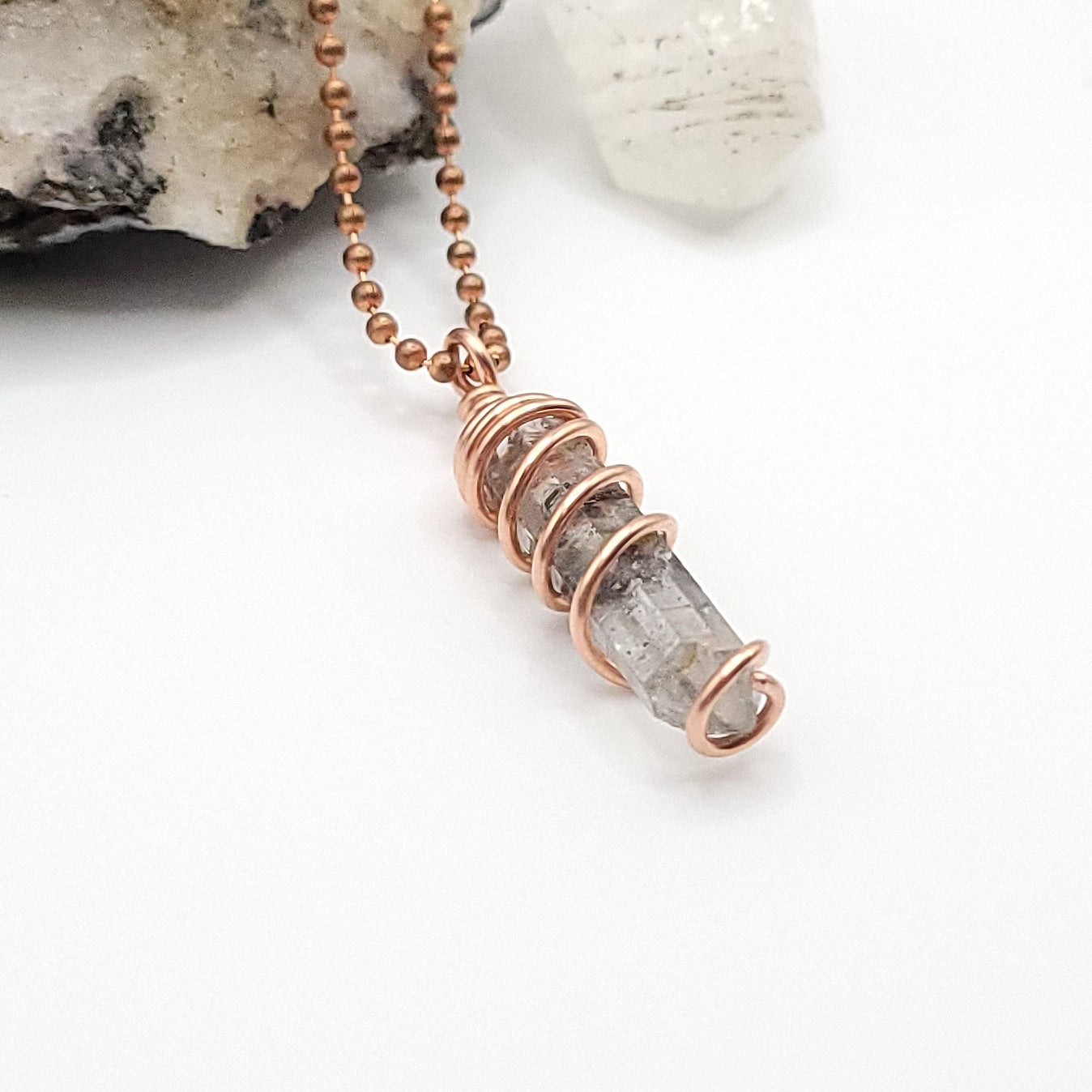 tibetan quartz necklace side view on white background