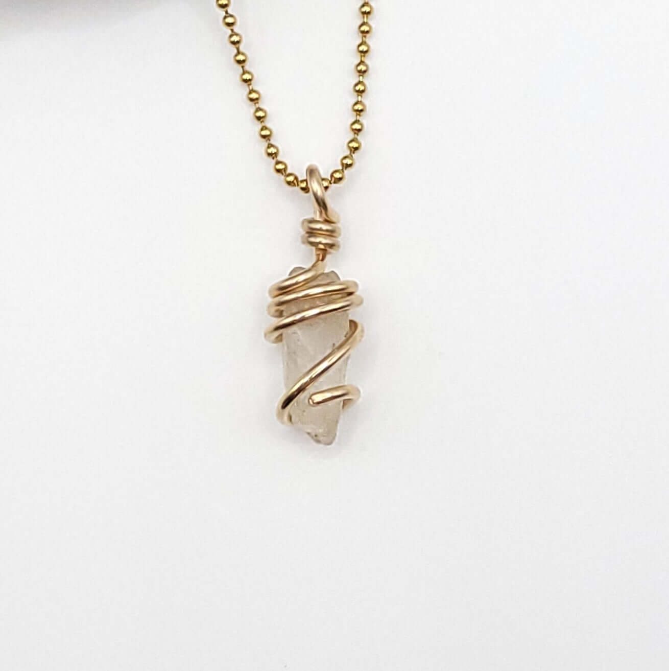 Raw Phenakite Necklace in Gold, white background