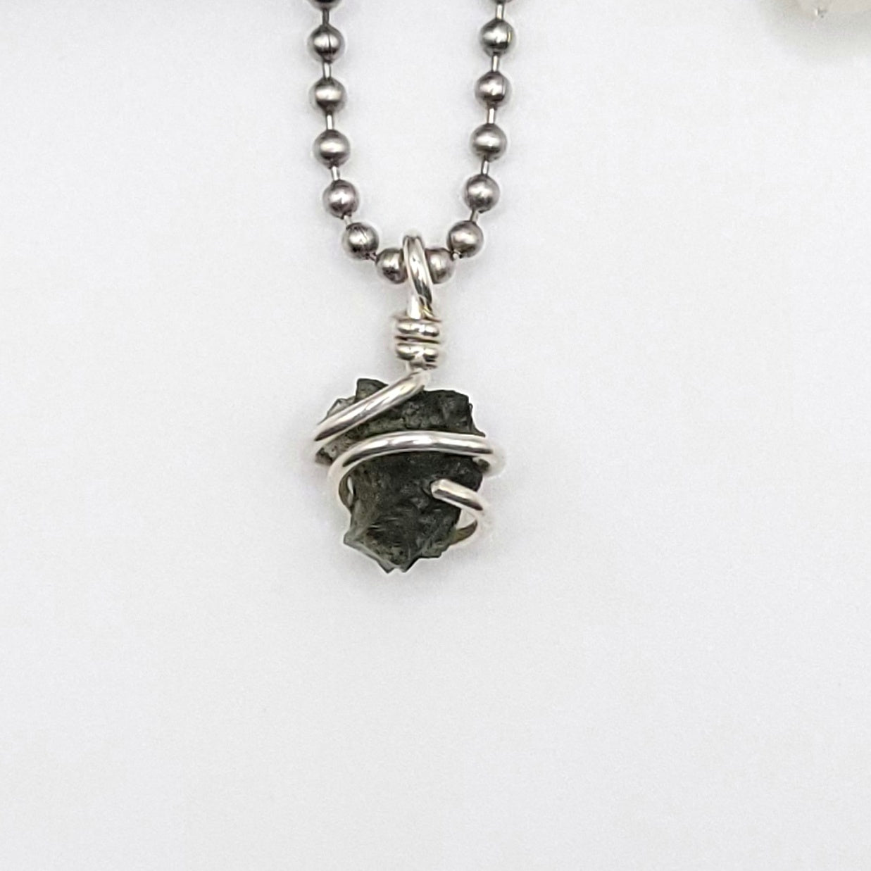 Raw Moldavite Crystal Necklace in Silver, close up
