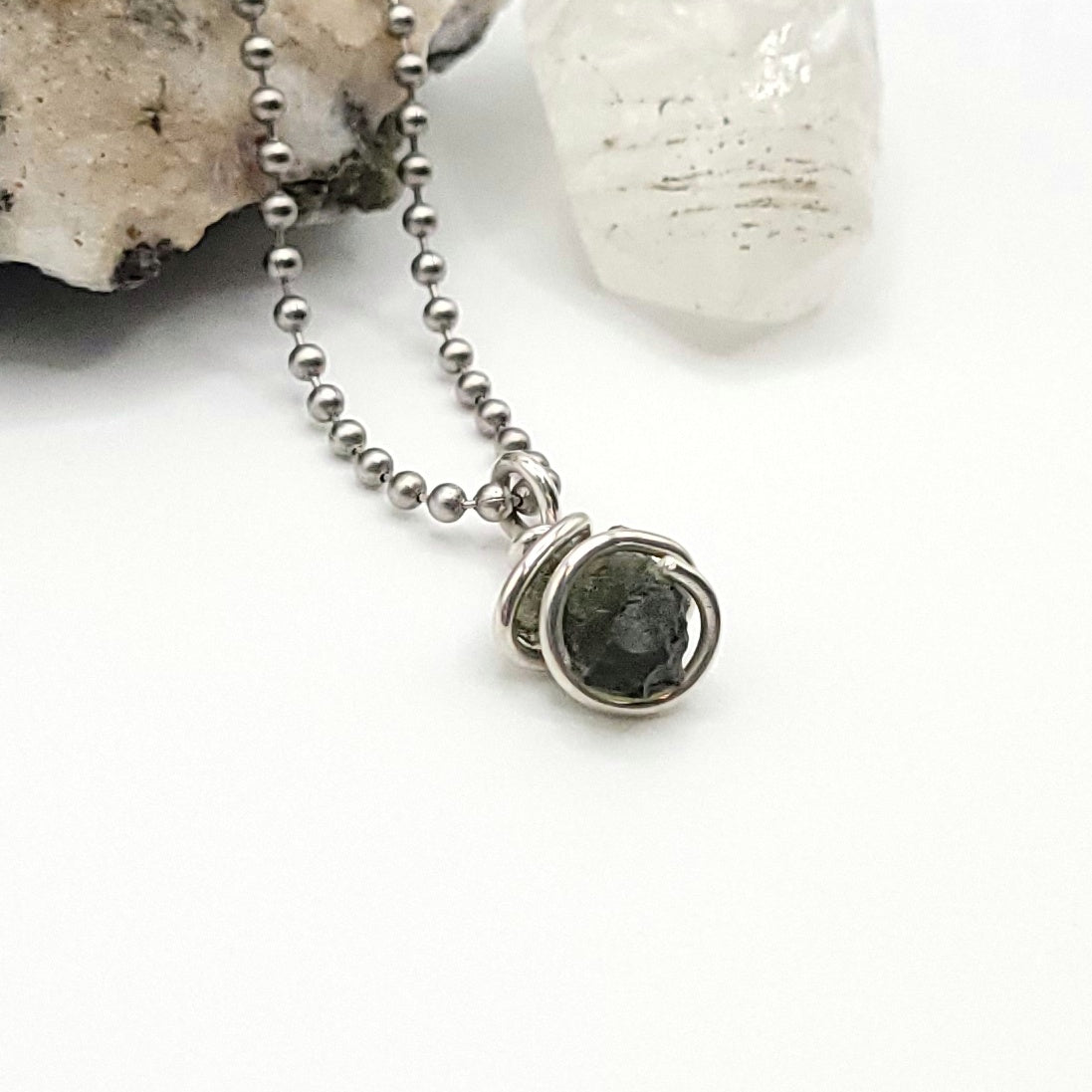 Raw Moldavite Crystal Necklace in Silver, side view