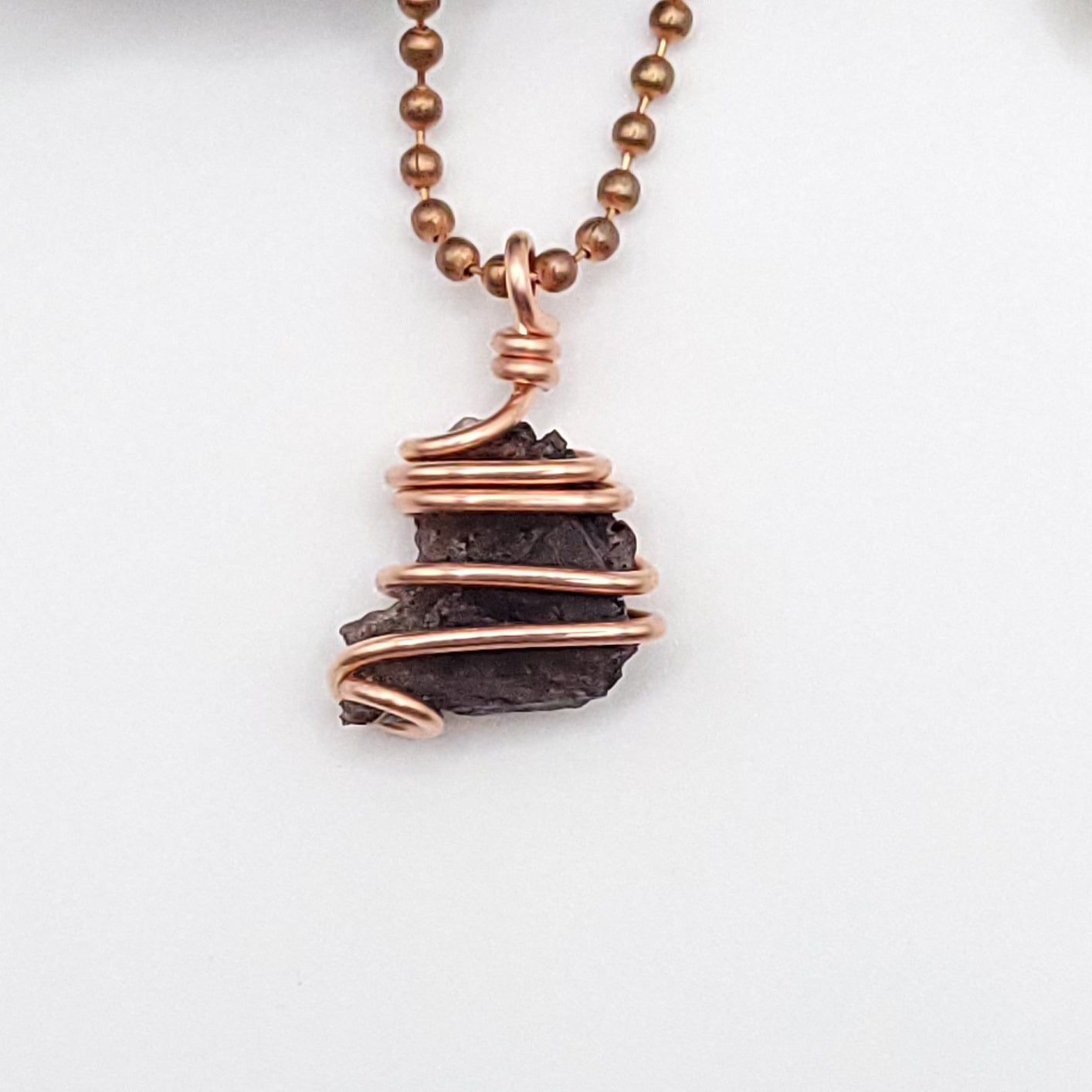 Raw Axinite Crystal Necklace in Copper, close up