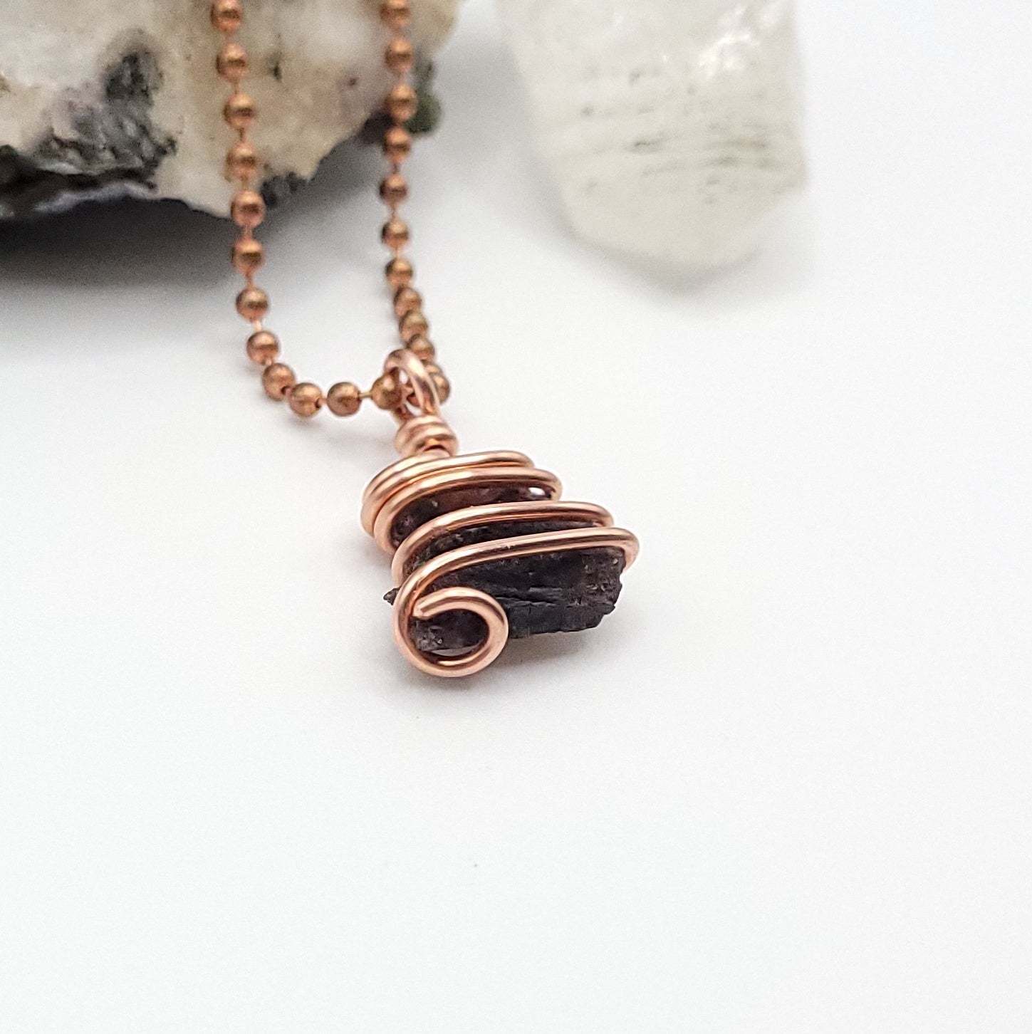 Raw Axinite Crystal Necklace in Copper, side view