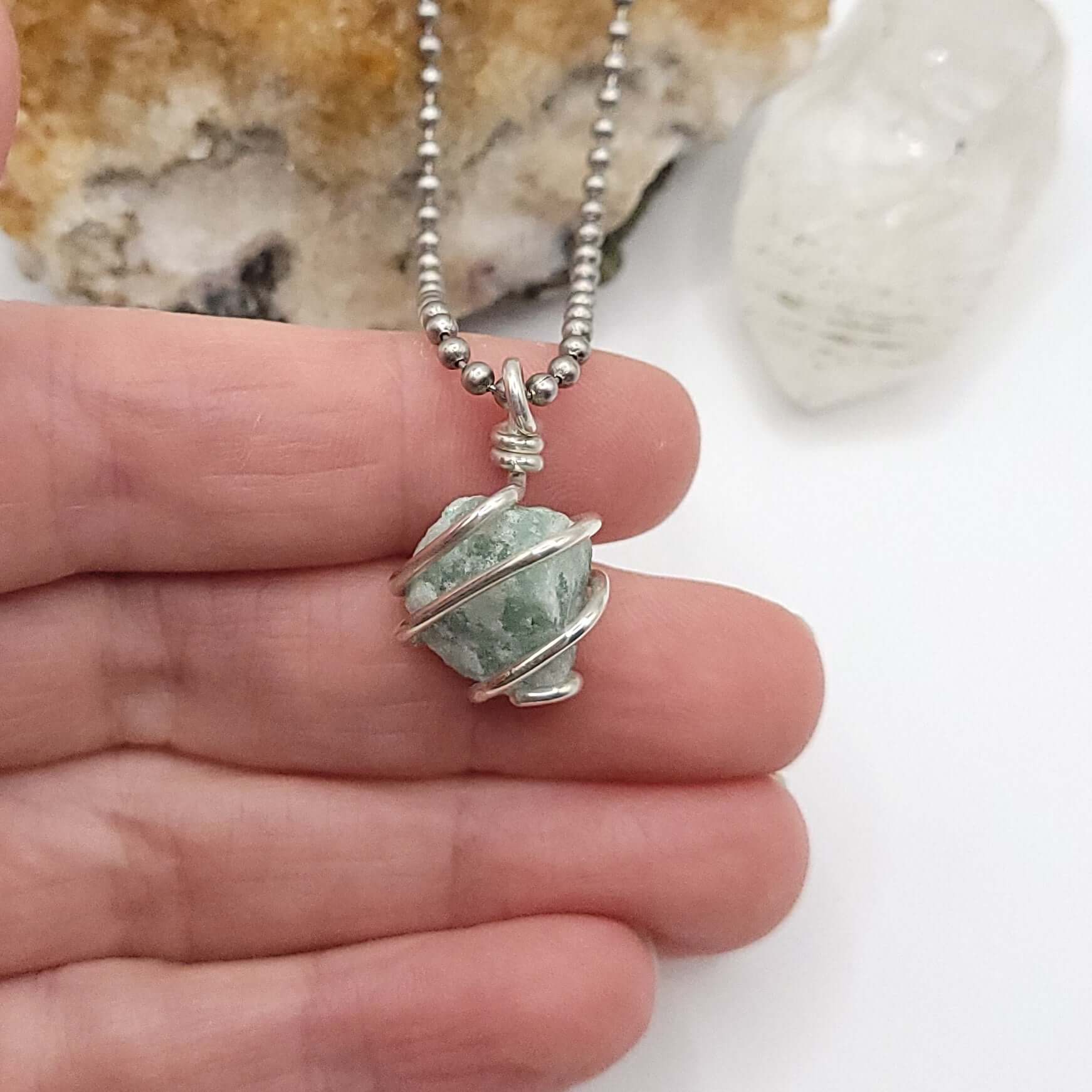 Raw Green Aventurine Crystal Necklace in Silver, in hand