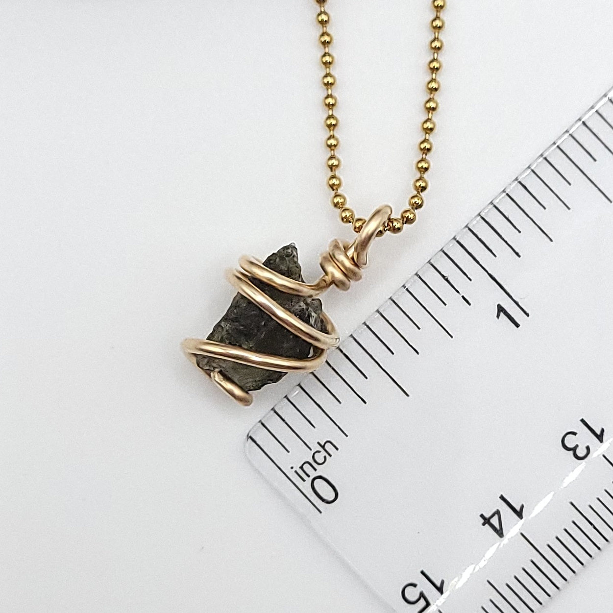 Raw Moldavite Necklace in Gold measurement just under 1"