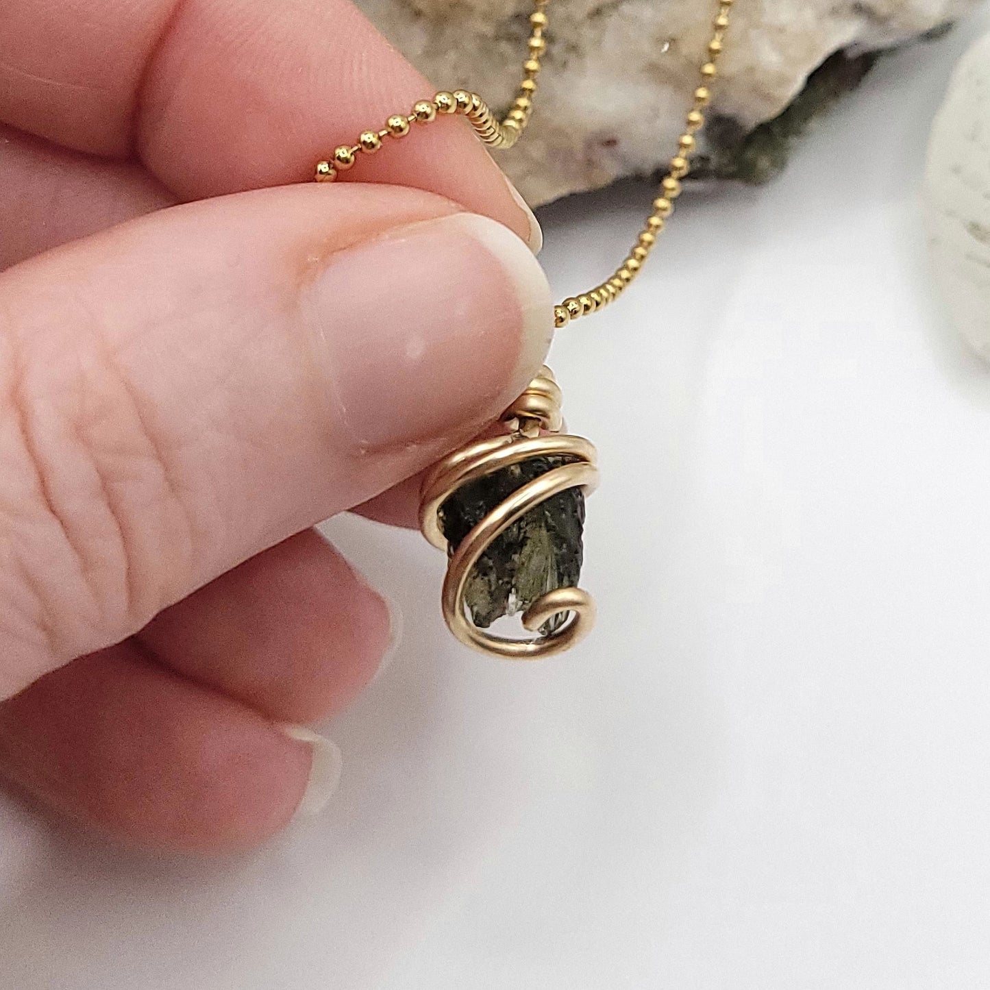 Raw Moldavite Necklace in Gold close up of texture