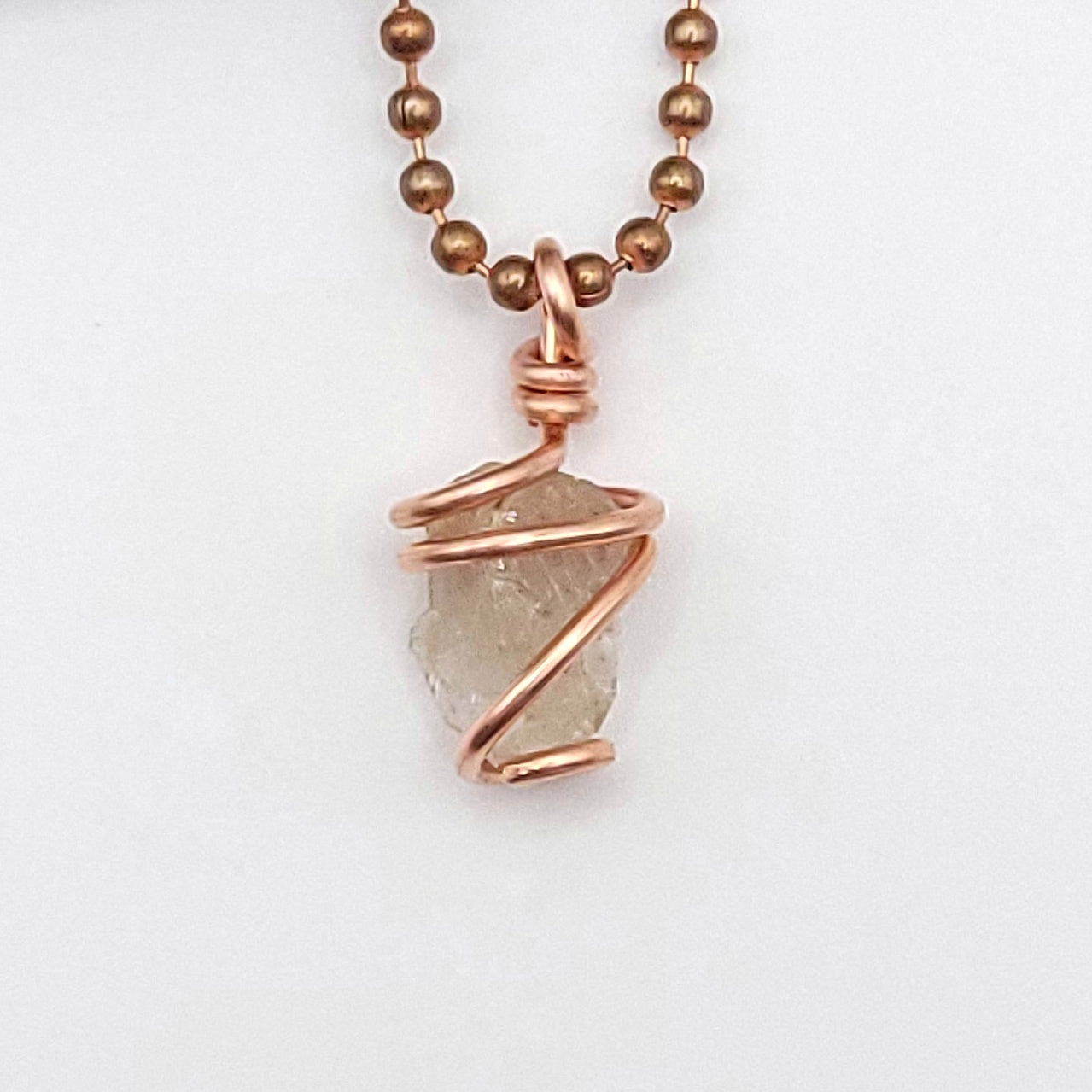 raw citrine pendant close up