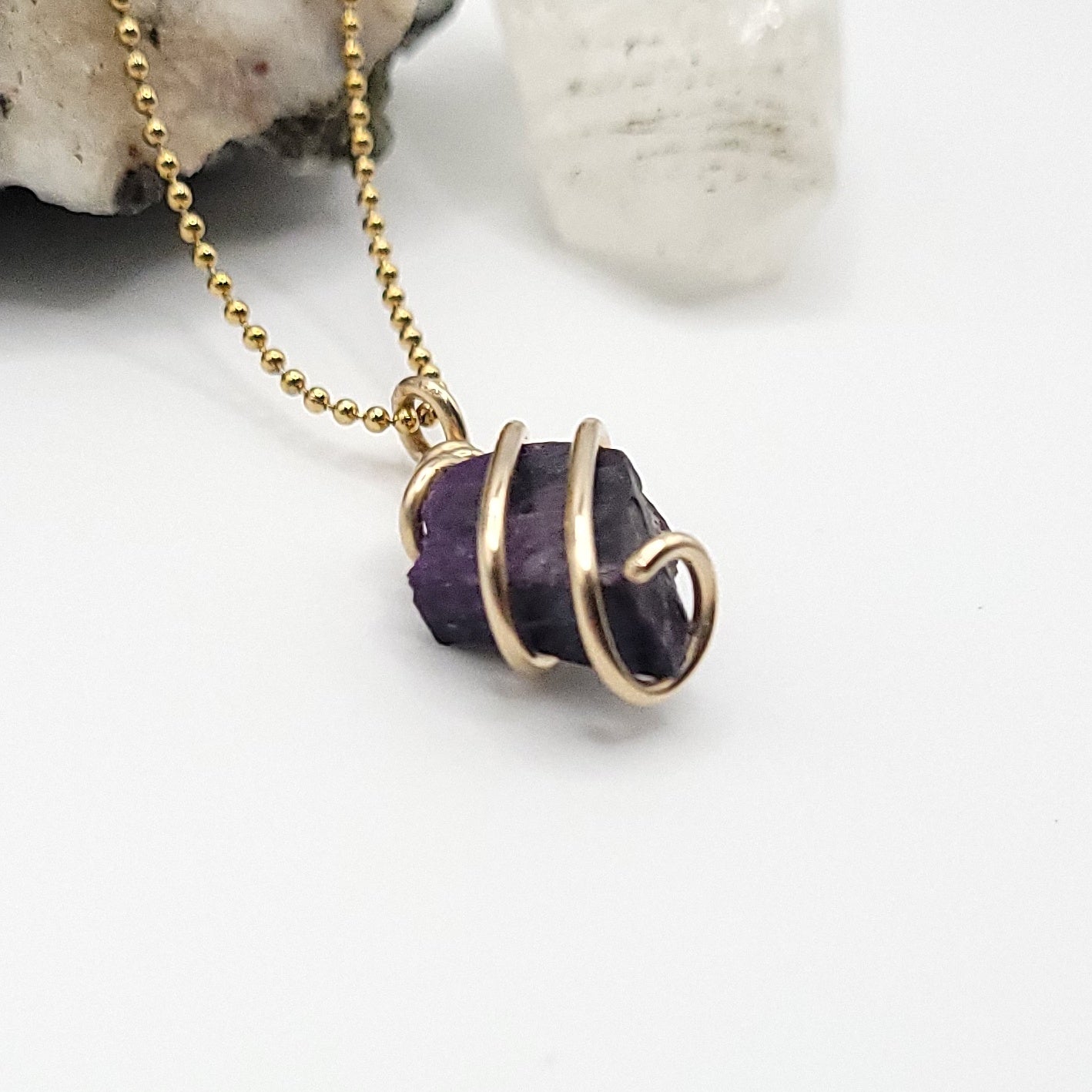 Raw Sugilite Crystal Necklace in Gold side view