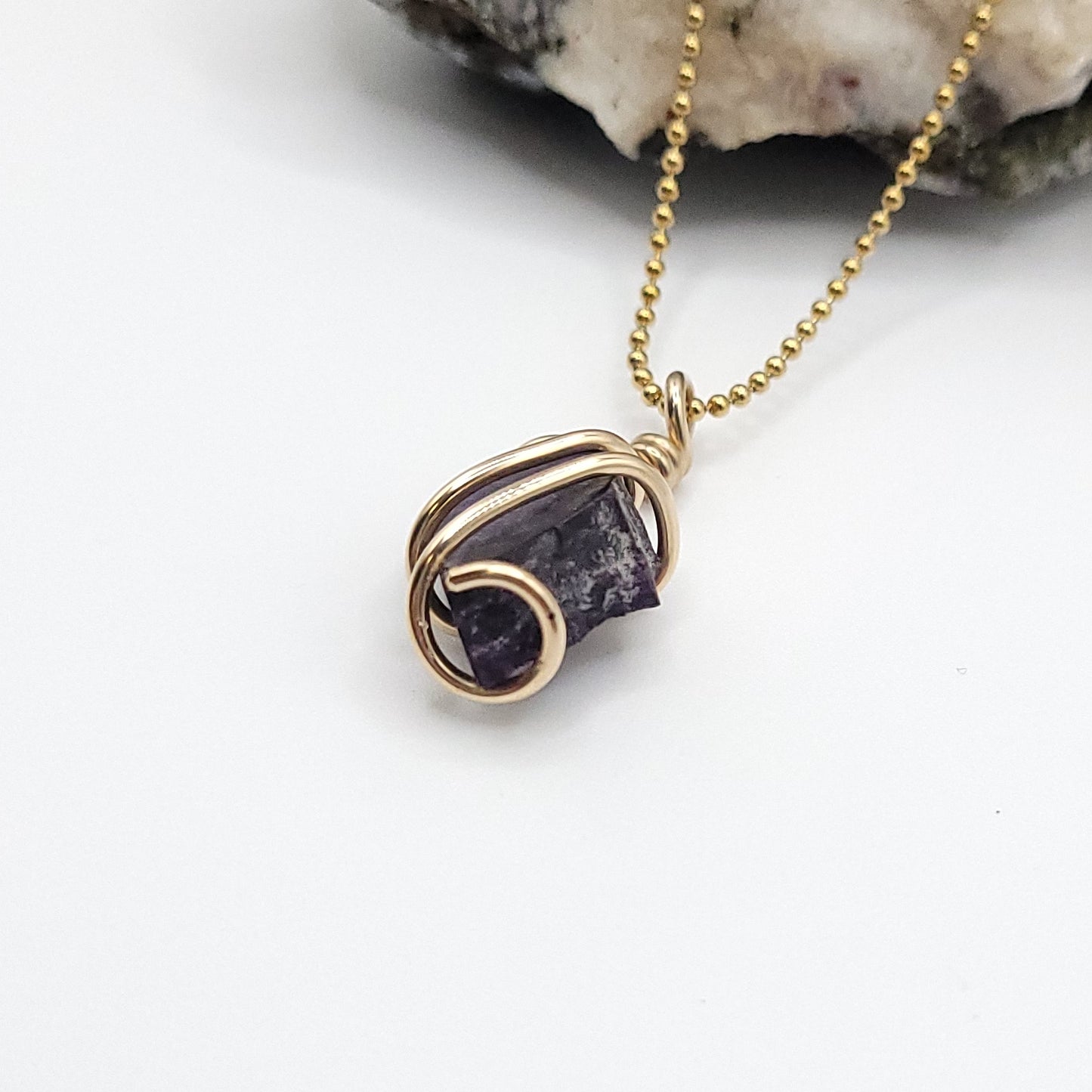 Raw Sugilite Crystal Necklace in Gold side view