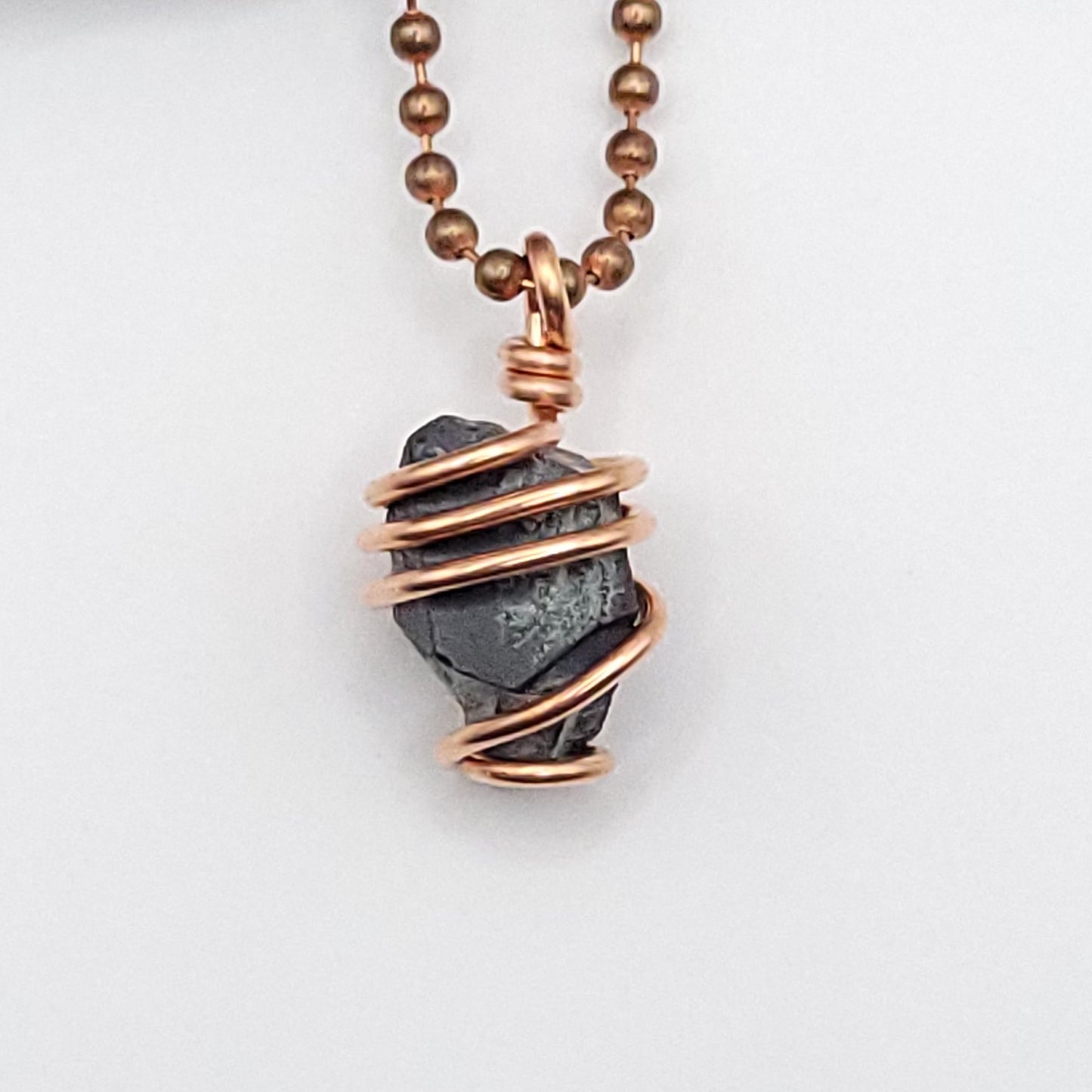Raw Magnetite Crystal Necklace in Copper close up