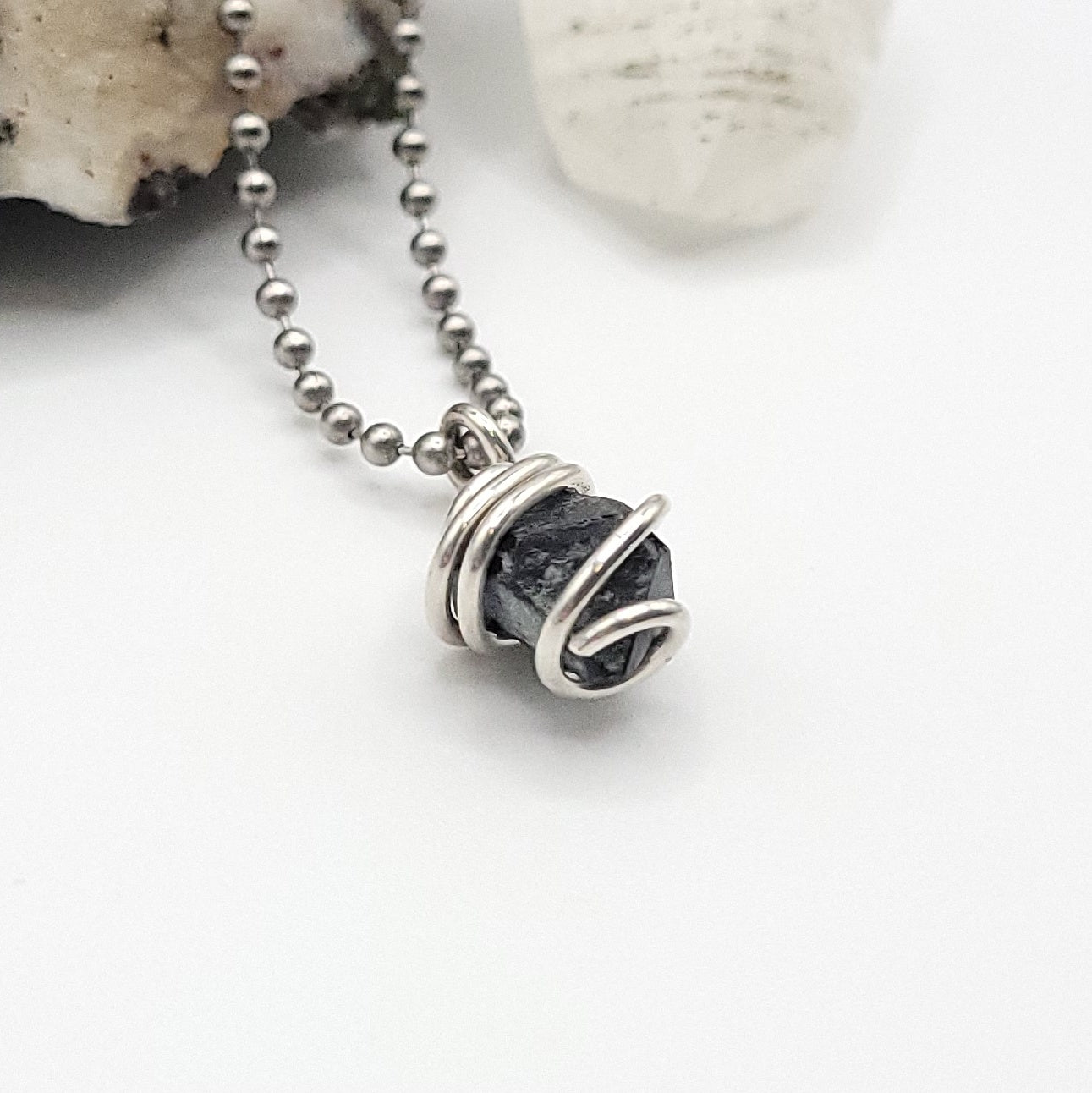 Raw Magnetite Crystal Necklace in Silver side view