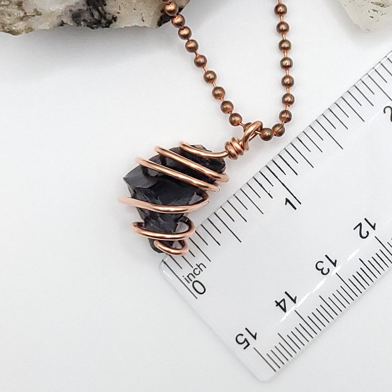 black obsidian necklace in copper on white background measurement