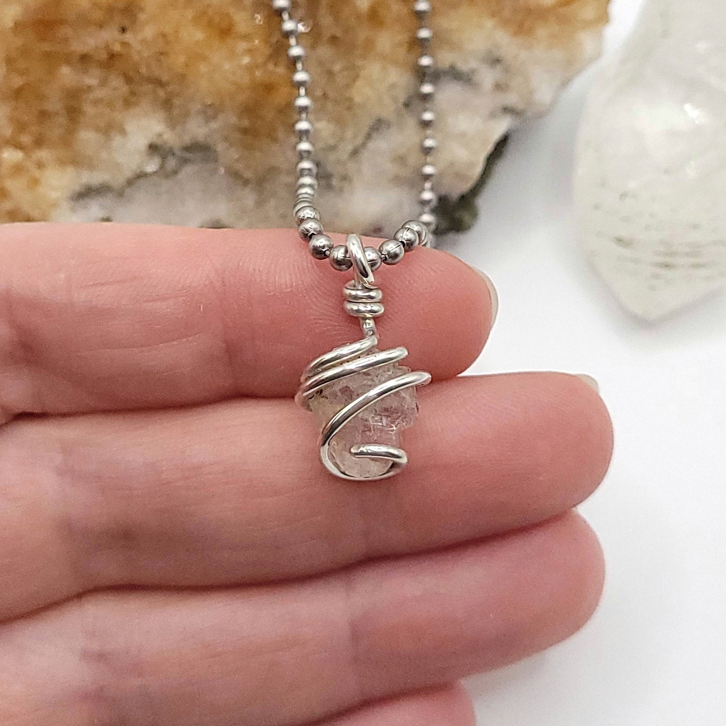 raw phenakite pendant in sterling silver wire