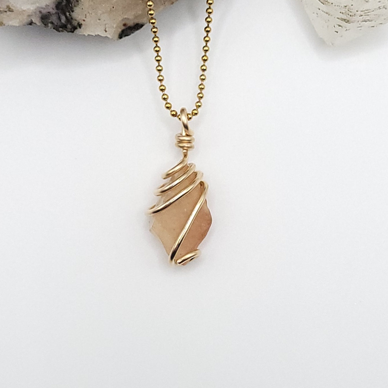 raw libyan desert glass wrapped in gold filled wire on a gold ball chain