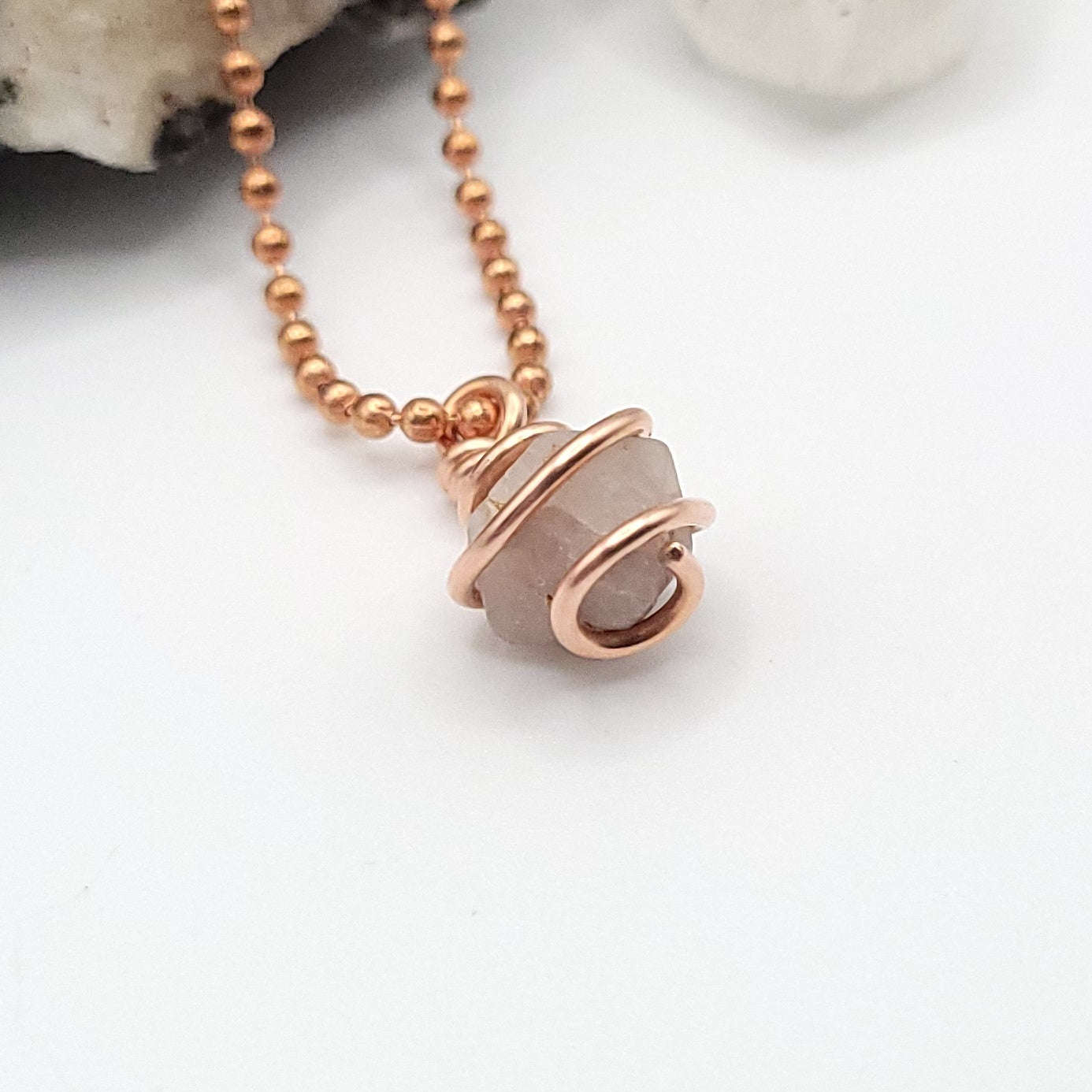 Beta Quartz necklace wrapped in copper showcasing transformation and clarity, enhancing high-frequency vibrations.