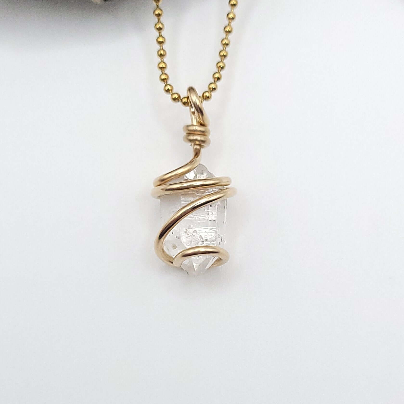 Raw Herkimer Diamond Quartz Necklace in Gold on white background