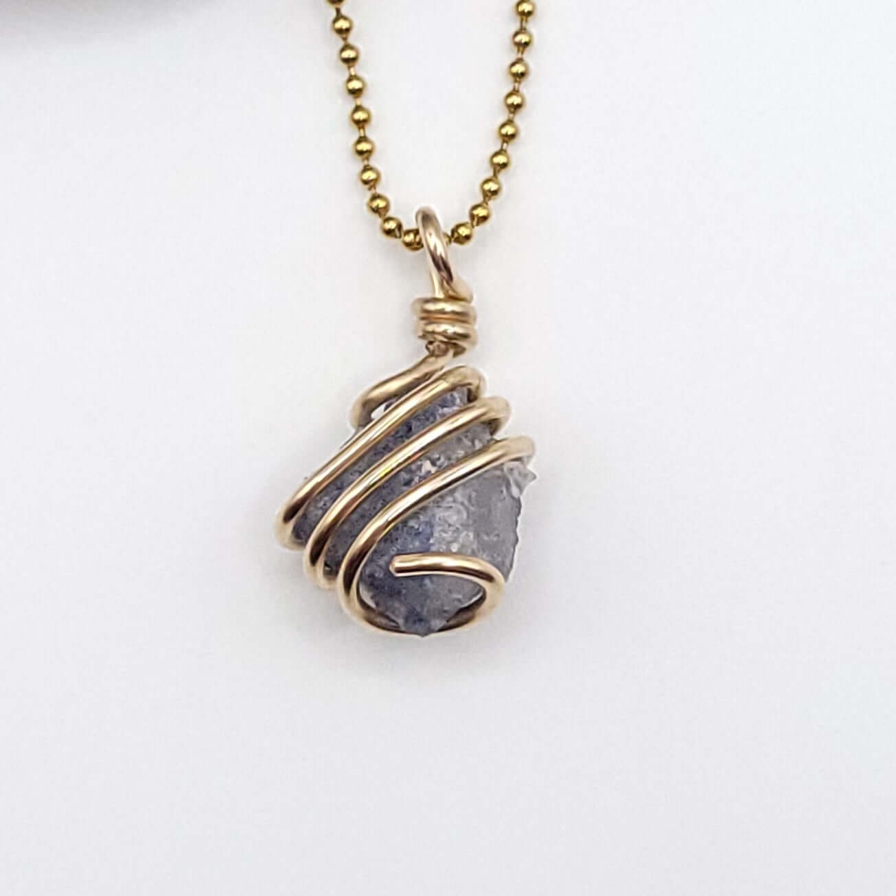 Dumortierite Quartz Crystal Pendant in Gold close up