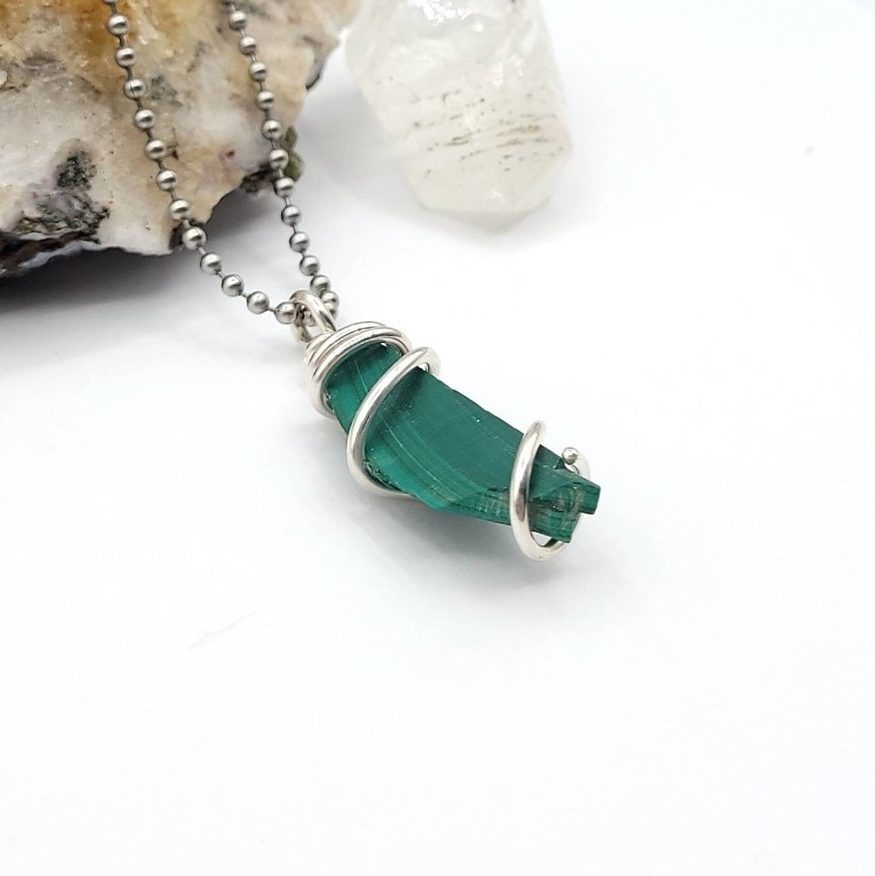 raw malachite necklace in silver side view