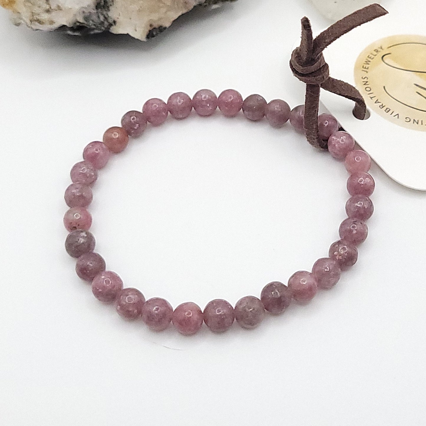 lepidolite bracelet, 7" beaded stretch bracelet on white background