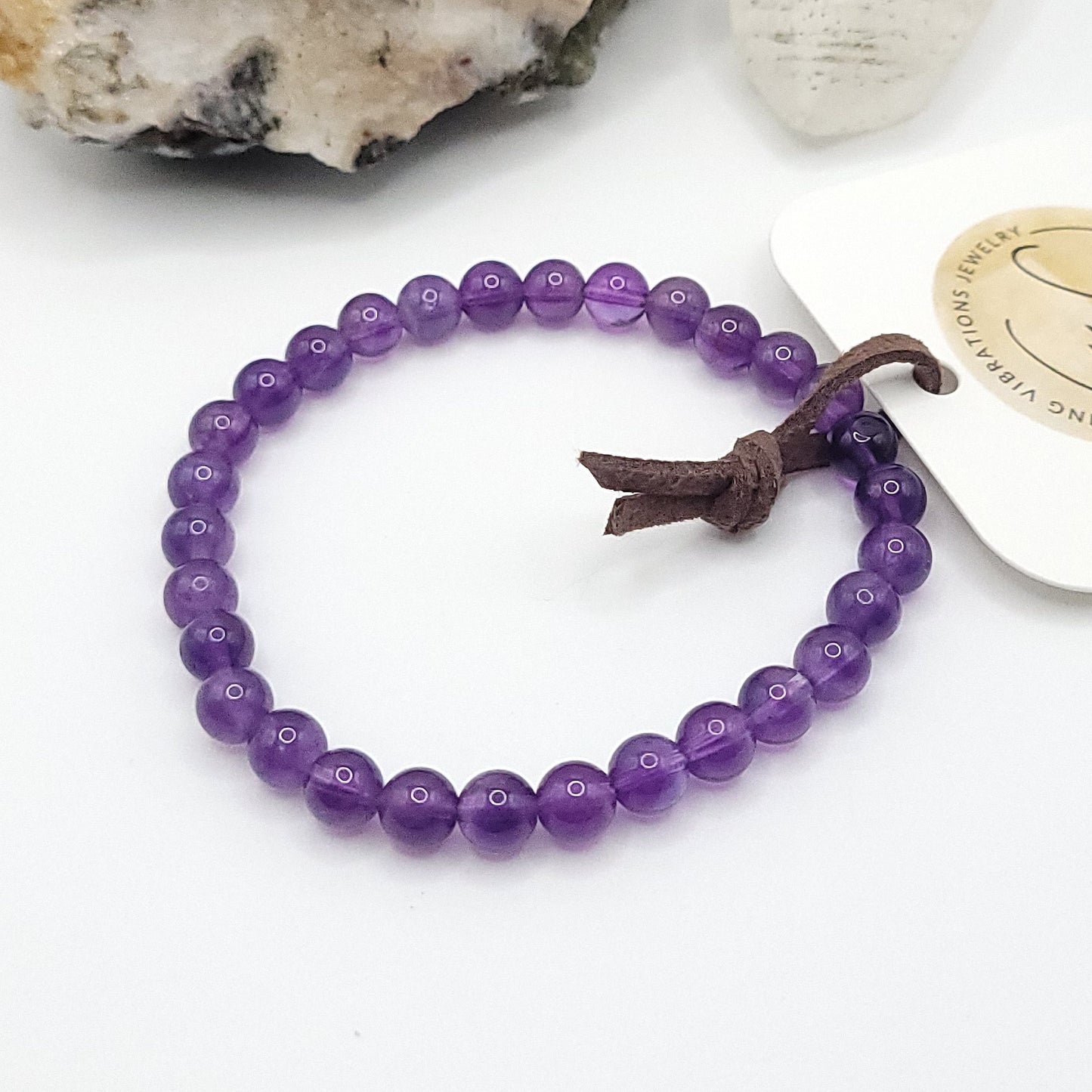 amethyst bracelet on white background