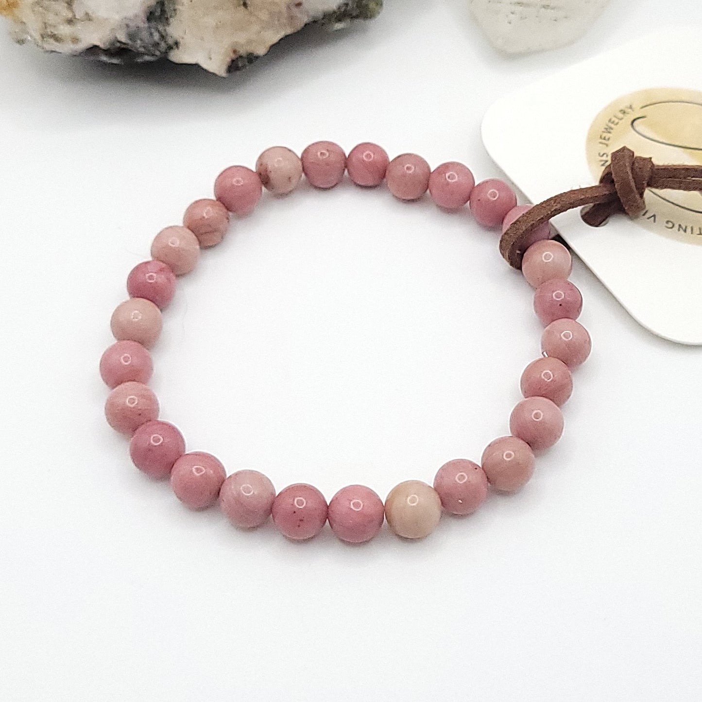 rhodonite bracelet, 7" beaded stretch bracelet on white background
