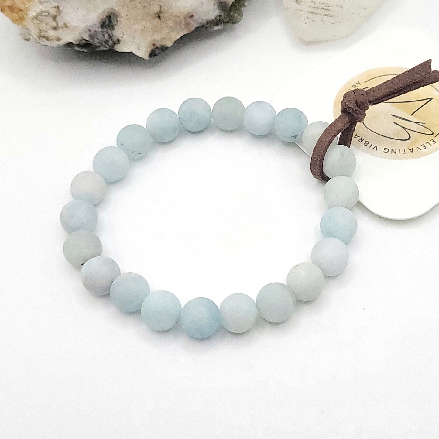 aquamarine bracelet, 7" beaded stretch bracelet on white background