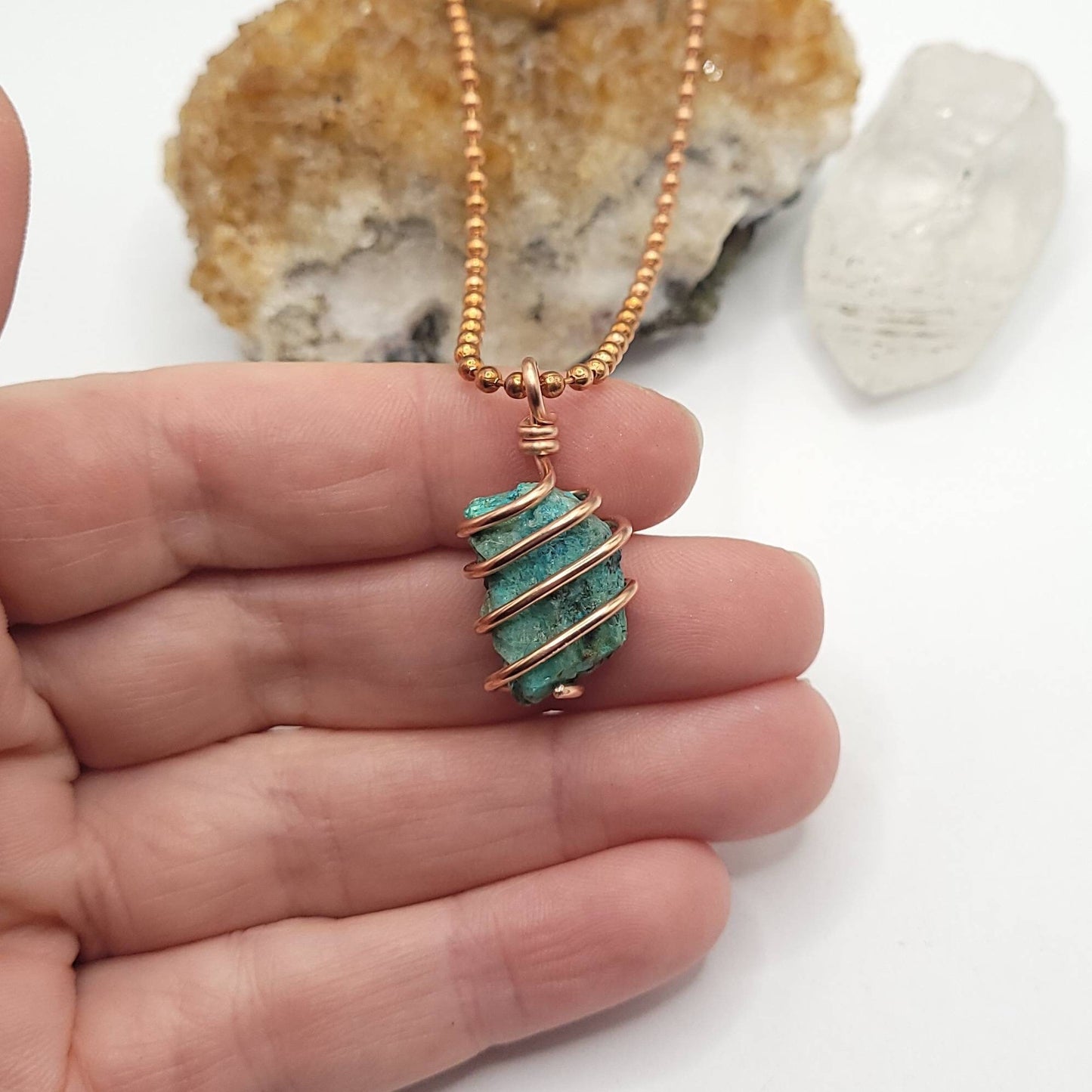 Raw Shattuckite Crystal Necklace in Copper, in hand