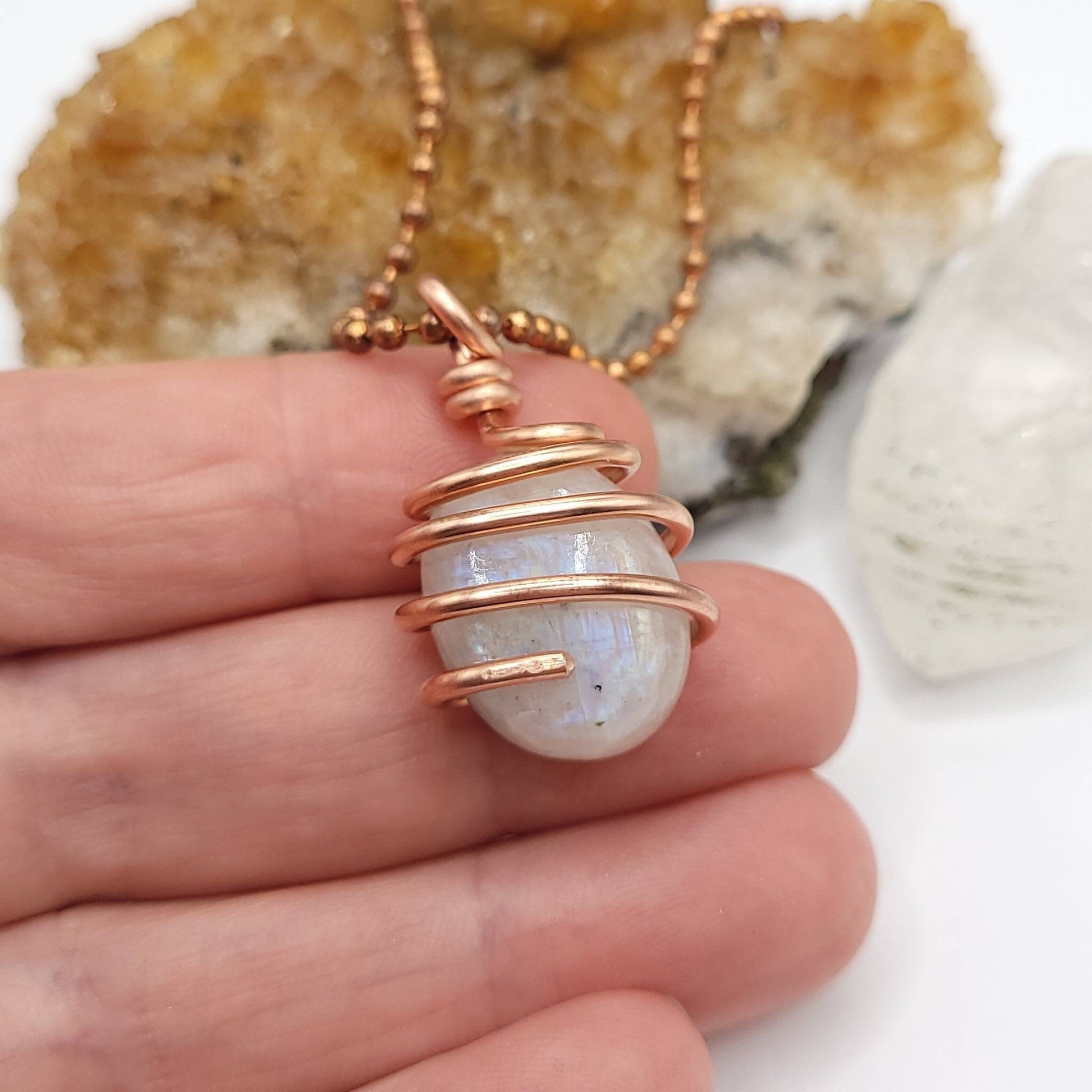 Rainbow Moonstone Necklace, Copper Wire Wrapped Moonstone Pendant in hand