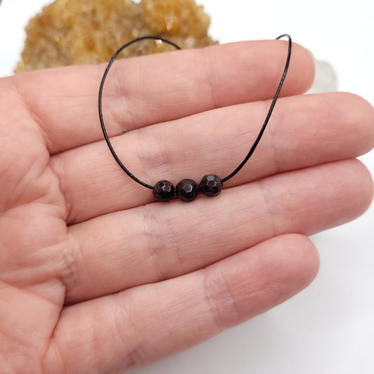 Adjustable Garnet Necklace on black cord with 3 garnet beads