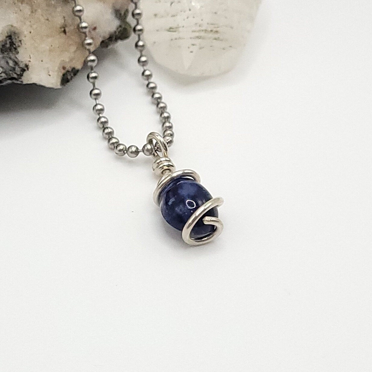 Sodalite Crystal Teardrop Necklace in Silver Wire side view