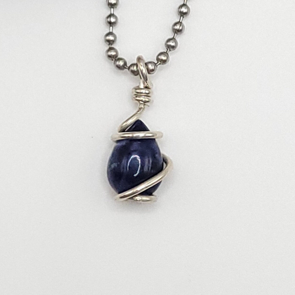 Sodalite Crystal Teardrop Necklace in Silver Wire close up