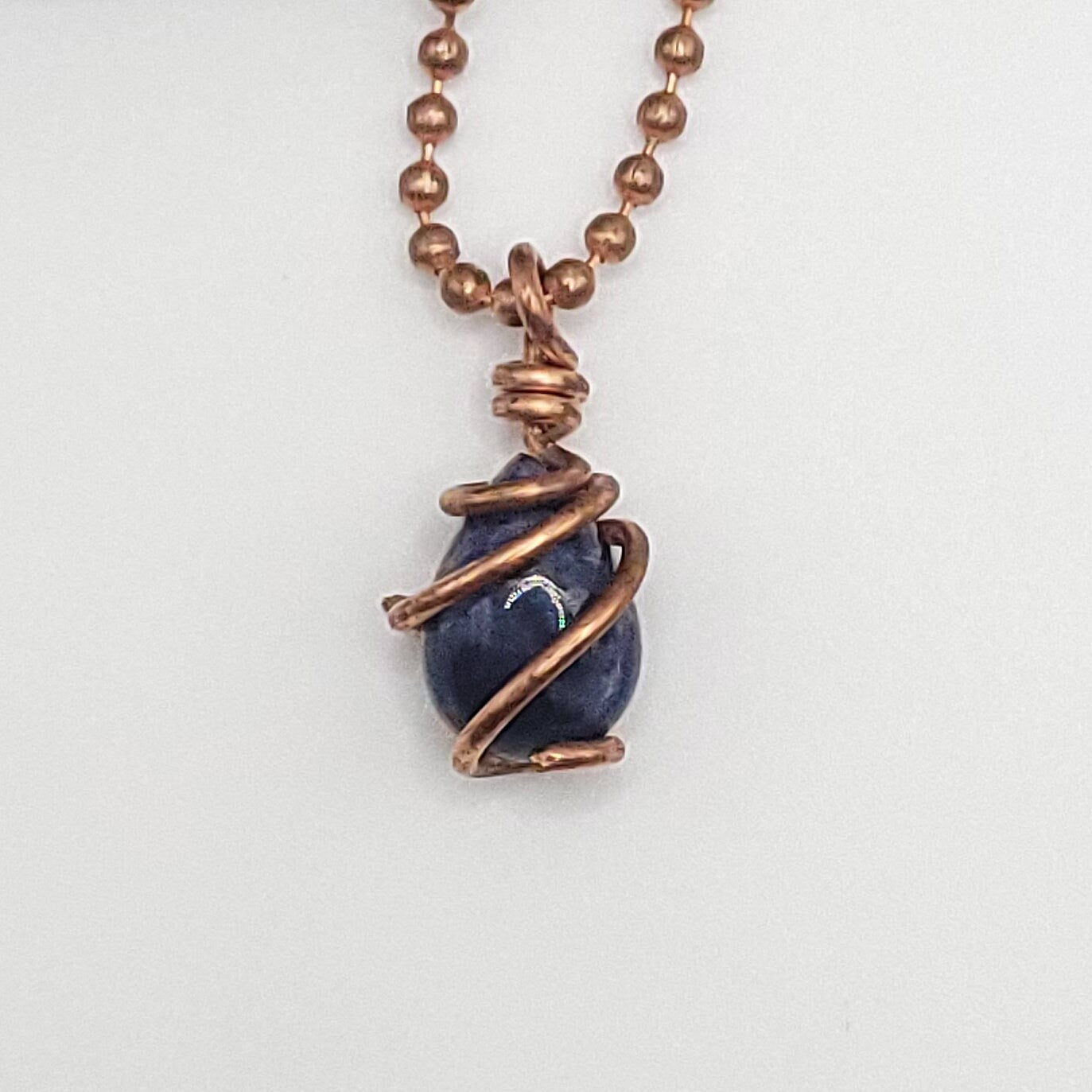 Sodalite Crystal Teardrop Necklace in Copper Wire close up
