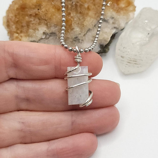 Rainbow Moonstone Necklace in Silver, rectangle shaped stone in hand