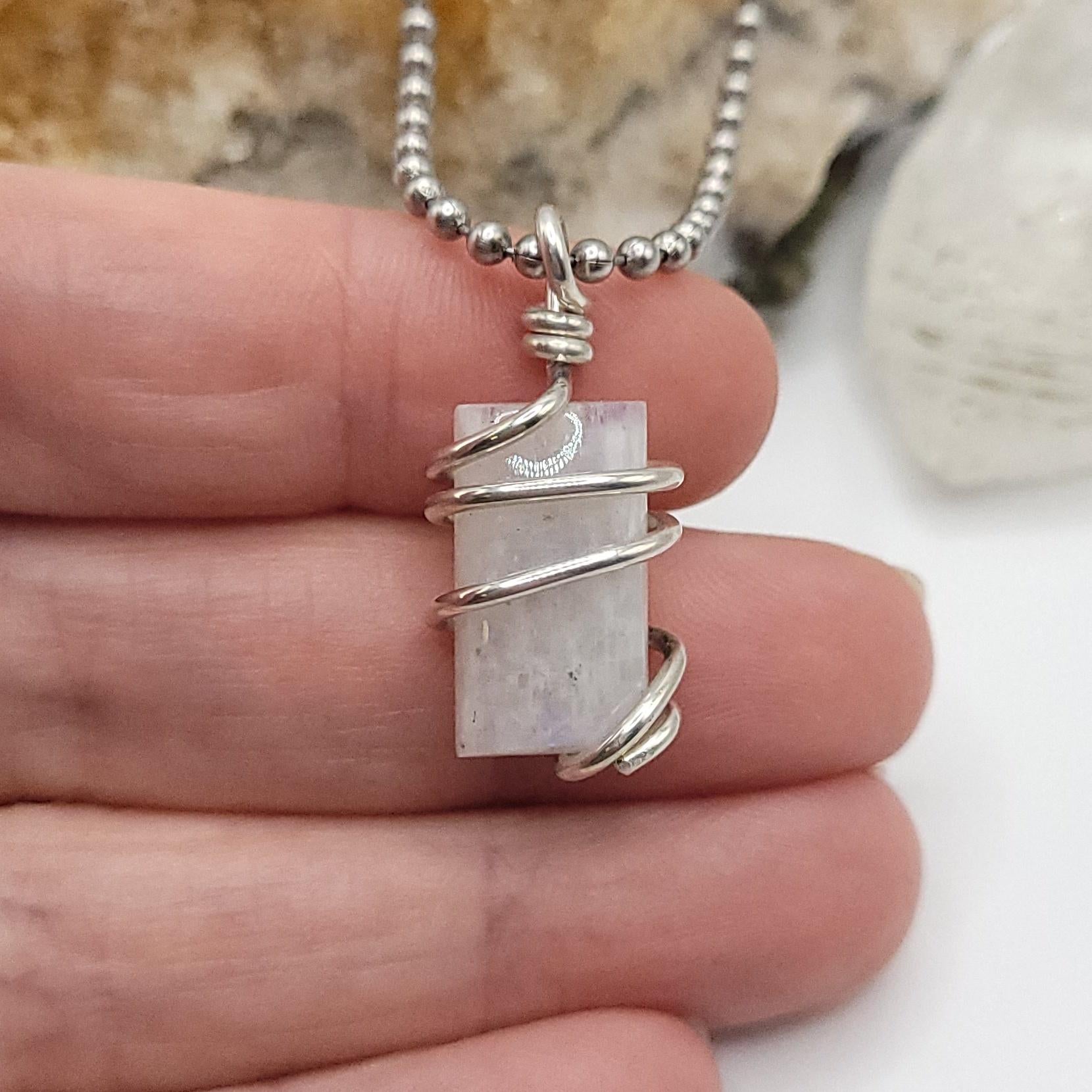 Rainbow Moonstone Crystal Necklace in Silver rectangle shaped stone close up