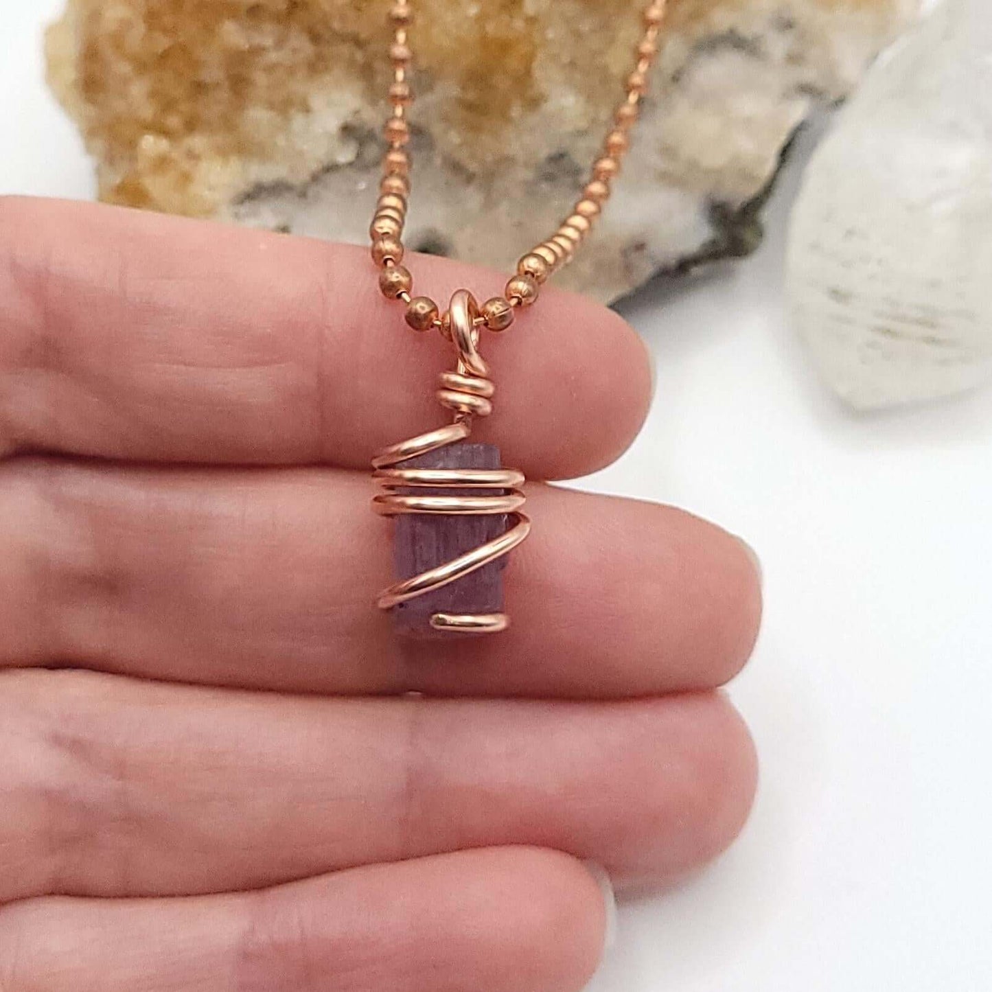 Raw Purple Scapolite Crystal Pendant in Copper, close up