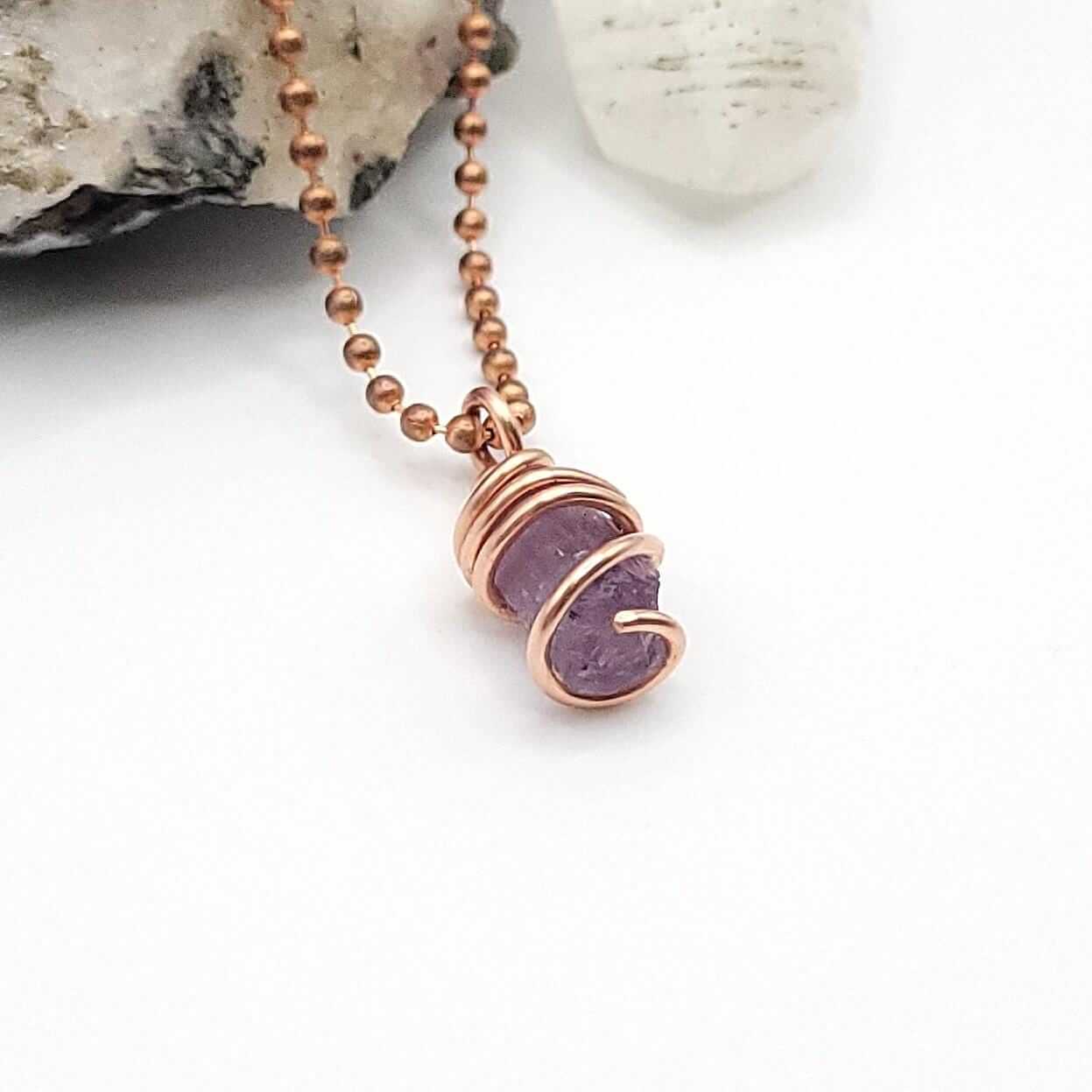 Raw Purple Scapolite Crystal Pendant in Copper, side view