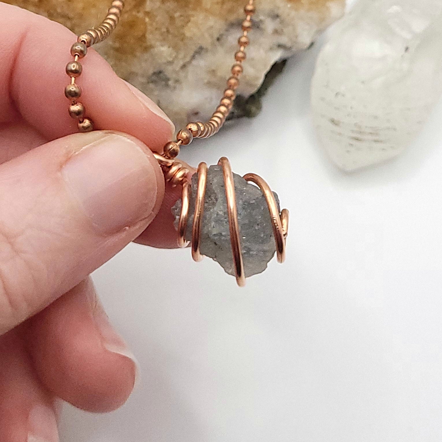 Raw Lazulite Crystal Necklace in Copper against light
