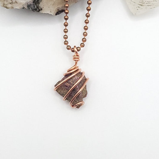 ruby necklace in copper on white background