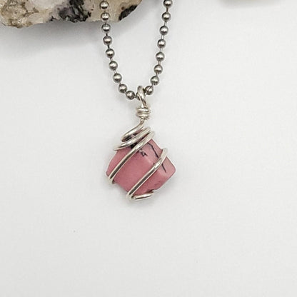 rhodonite necklace in silver on white background