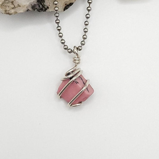 rhodonite necklace in silver on white background